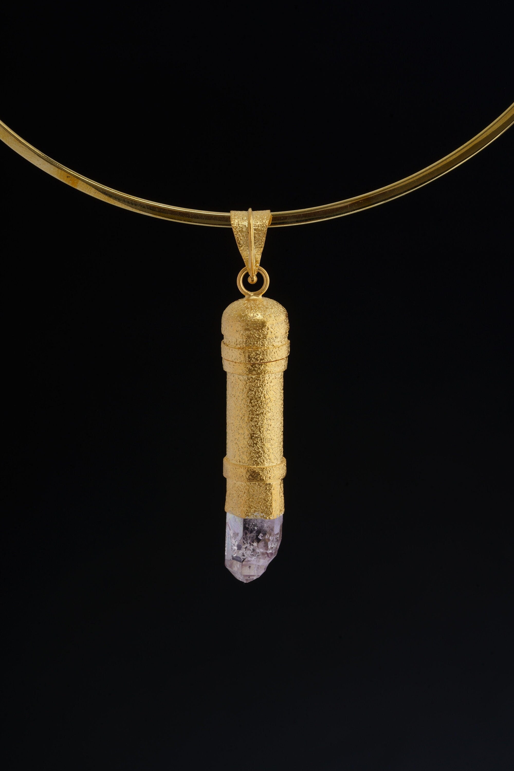 Gold Amethyst capsule pendant displayed on choker with 16k gold-plated sterling silver and crystal point.