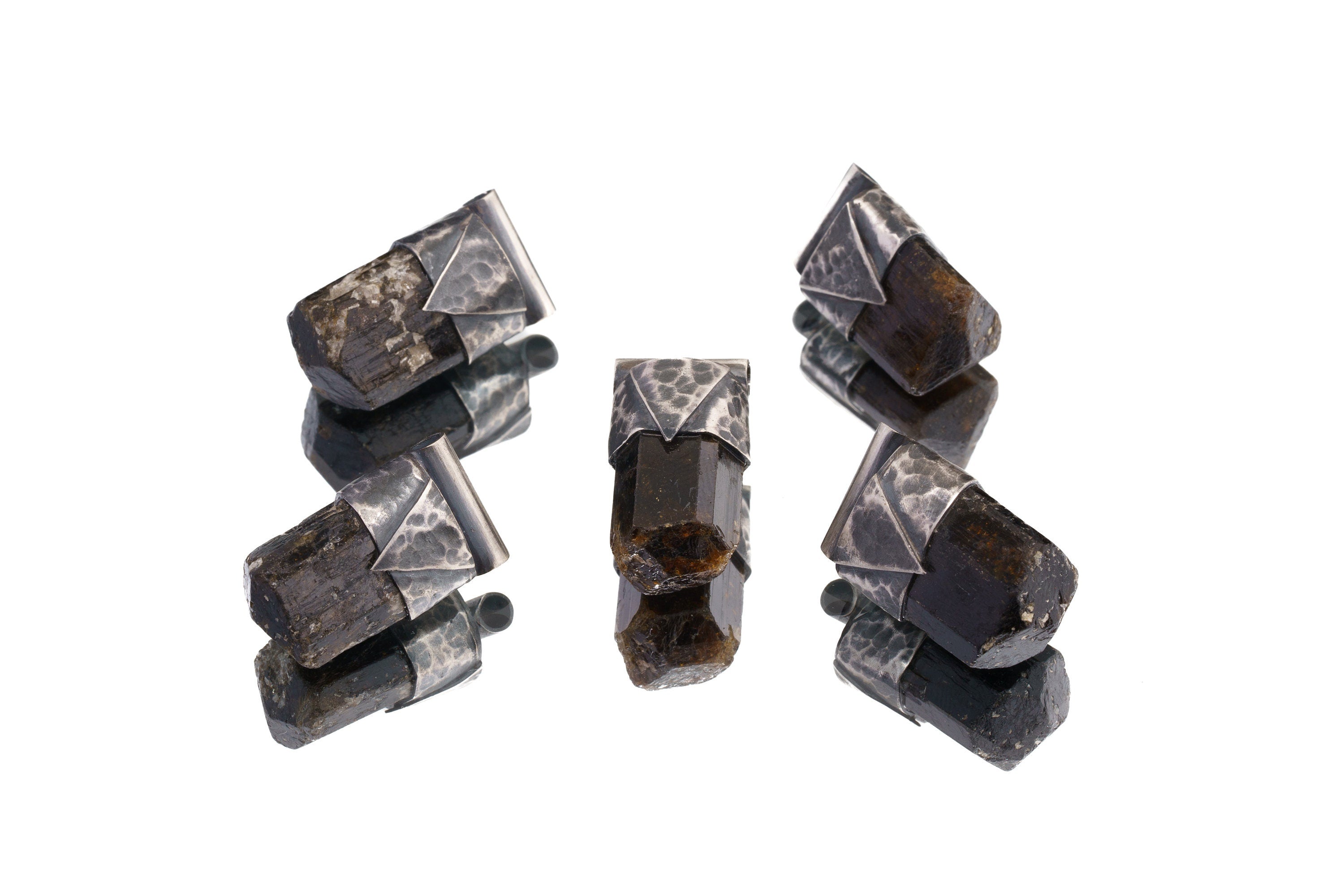 Group of Himalayan Dravite Tourmaline Stack Pendants shown on white background with dark terminated crystals and silver caps.