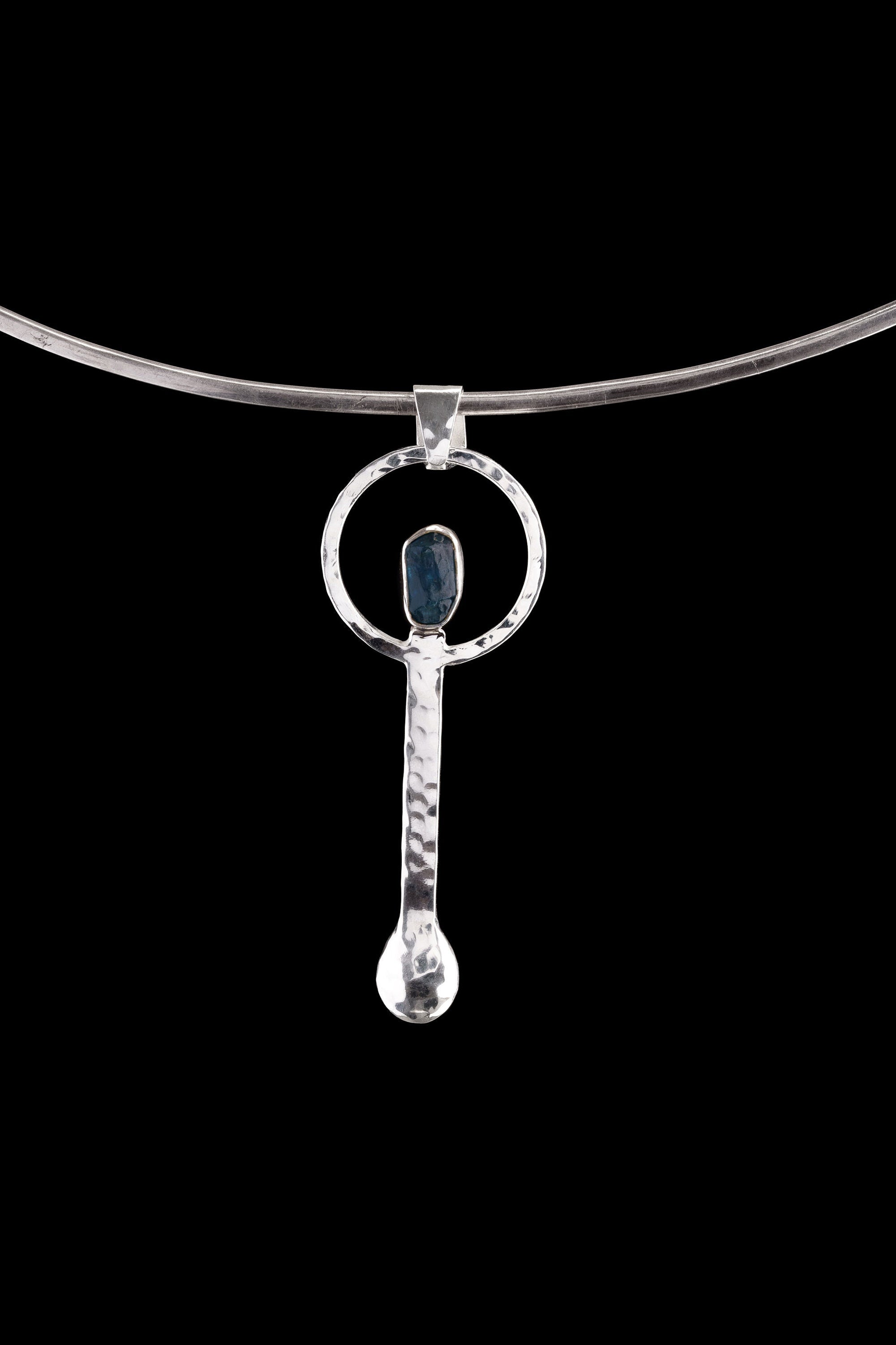 Blue Apatite ritual spoon pendant shown on a silver choker with solid 925 sterling silver and bright blue stone detail.