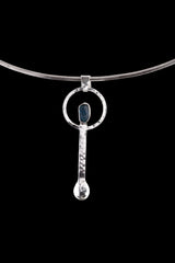 Blue Apatite ritual spoon pendant shown on a silver choker with solid 925 sterling silver and bright blue stone detail.