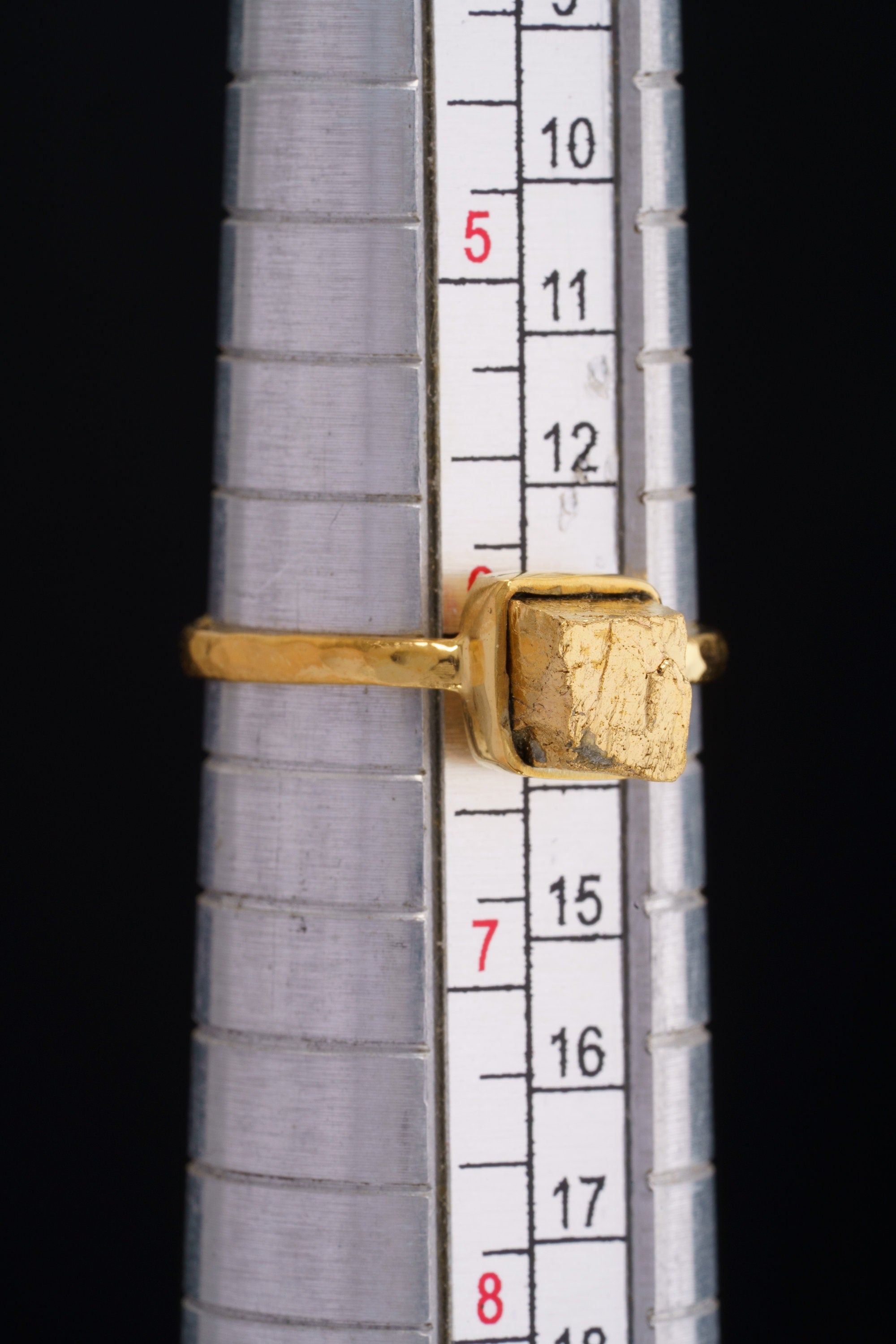 Gold-plated Pyrite ring shown on a mandrel for size reference, appearing around US size 6 to 6.5.