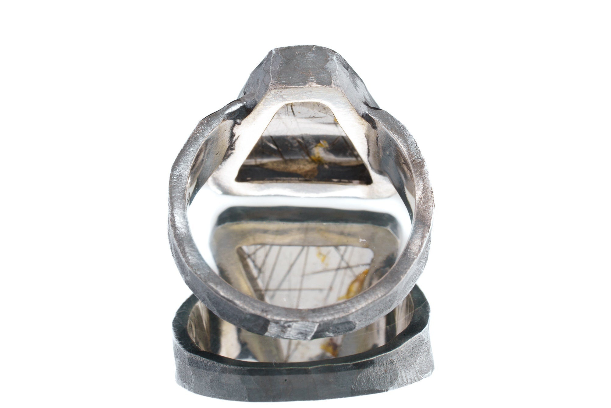 Back view of Rutilated Quartz ring showing open-back bezel construction and hammered oxidized sterling silver band.