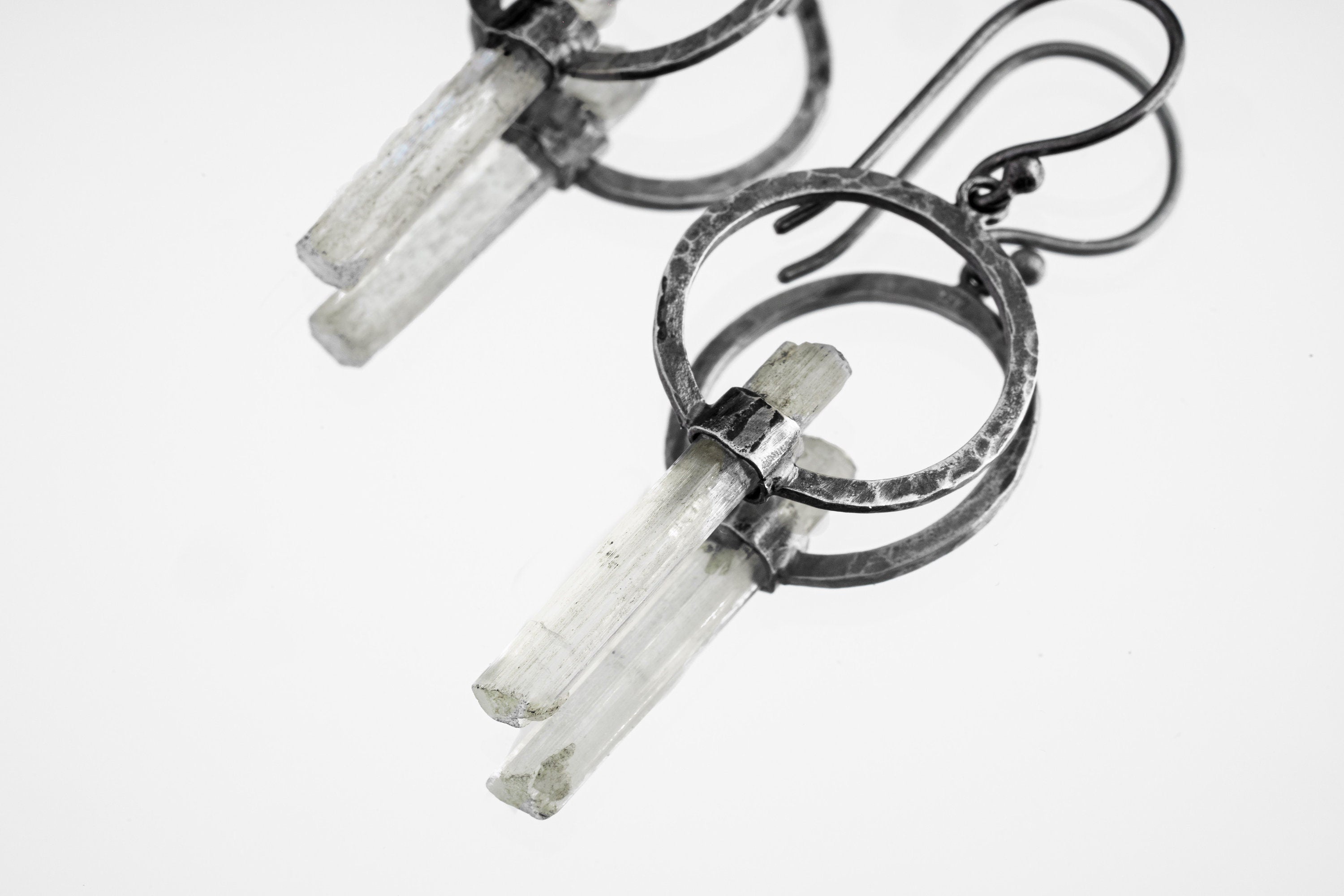 Himalayan Aquamarine hoop earrings in handmade 925 sterling silver with hammer-textured circle design and raw crystal wands.