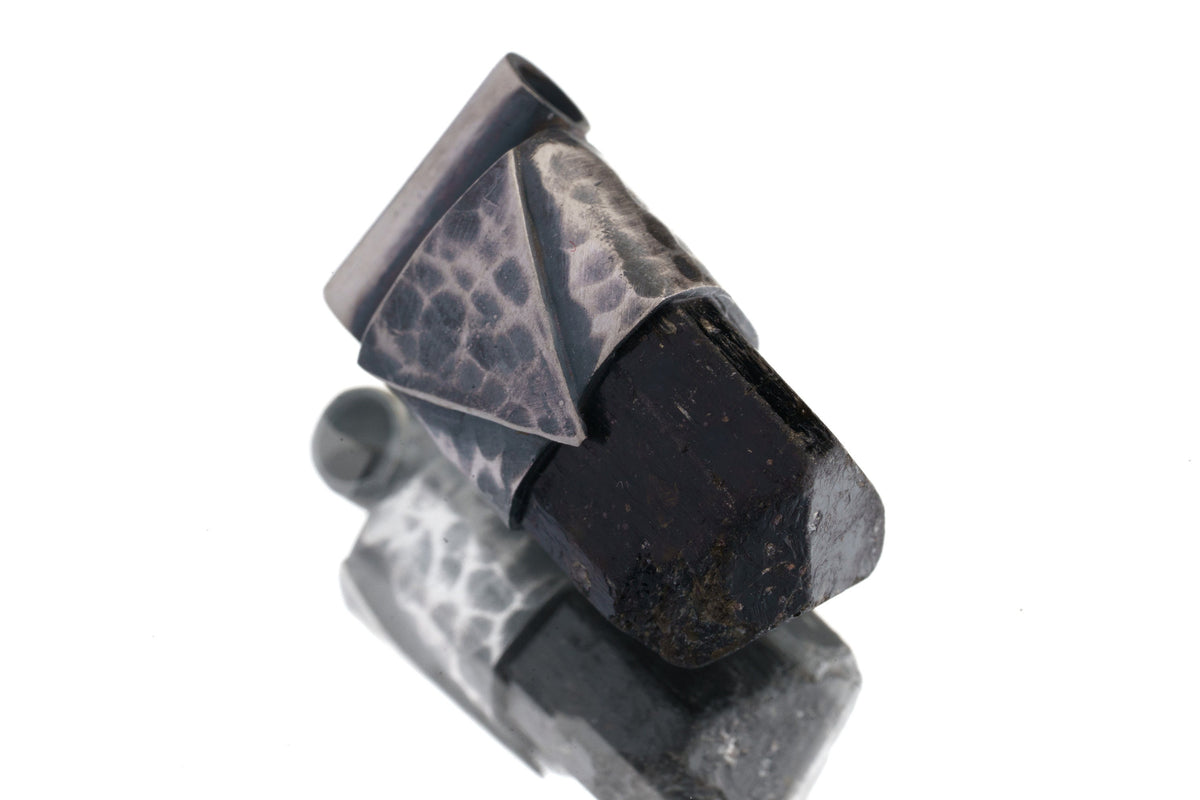 Himalayan Dravite Tourmaline Stack Pendant shown on white background with oxidized sterling silver cap and dark terminated crystal.