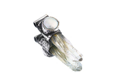 Nepal Quartz and South Sea Pearl Stack Pendant shown on white background with oxidized silver cap and pointed crystal body.