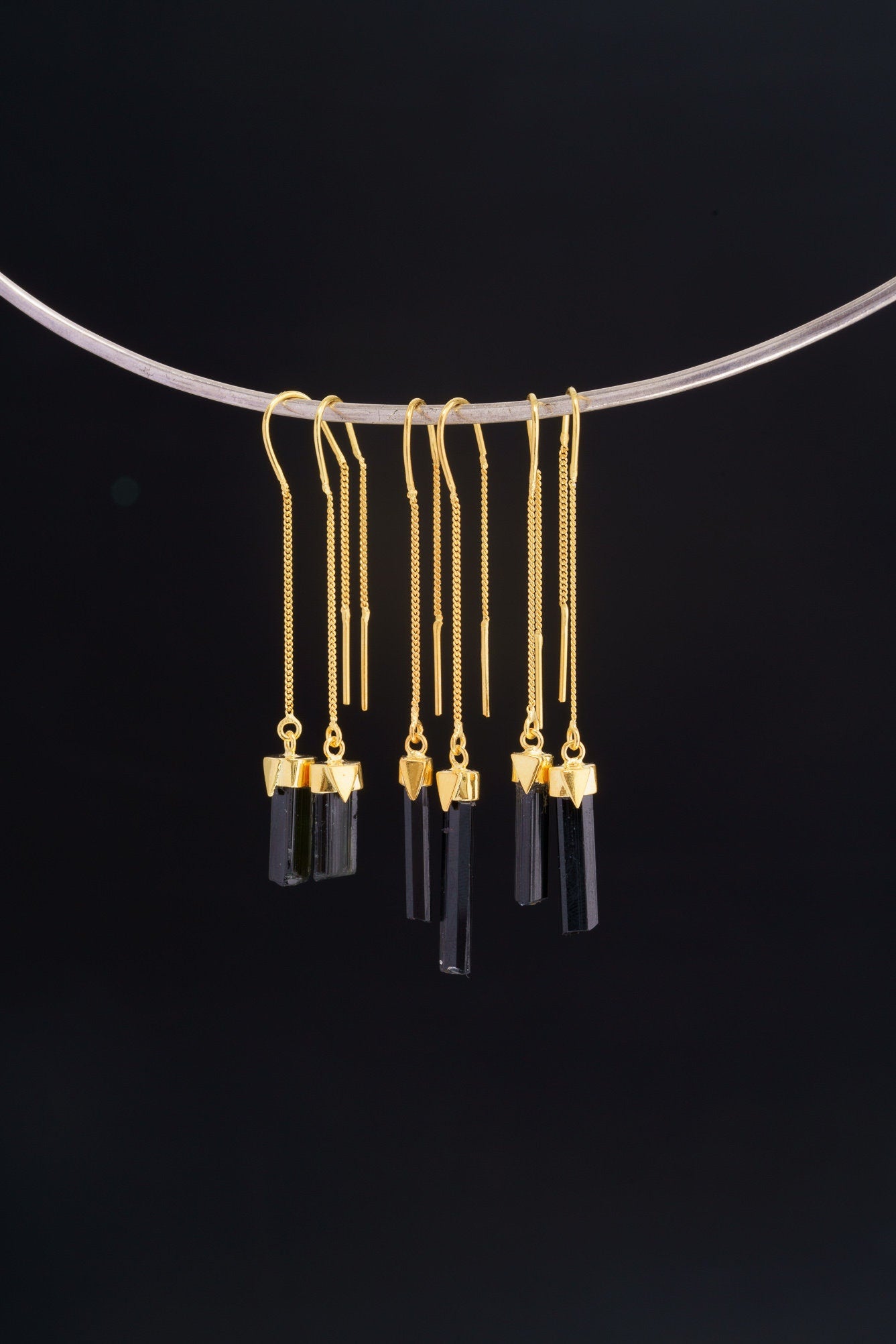 Gold-plated Tourmaline dangle earrings shown on a silver choker, with slim black crystal drops and 925 silver hooks.
