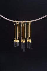 Gold-plated Tourmaline dangle earrings shown on a silver choker, with slim black crystal drops and 925 silver hooks.