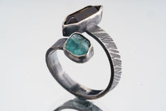 Close-up of Smoky Quartz and Blue Apatite in a textured sterling silver adjustable ring with polished highlights.