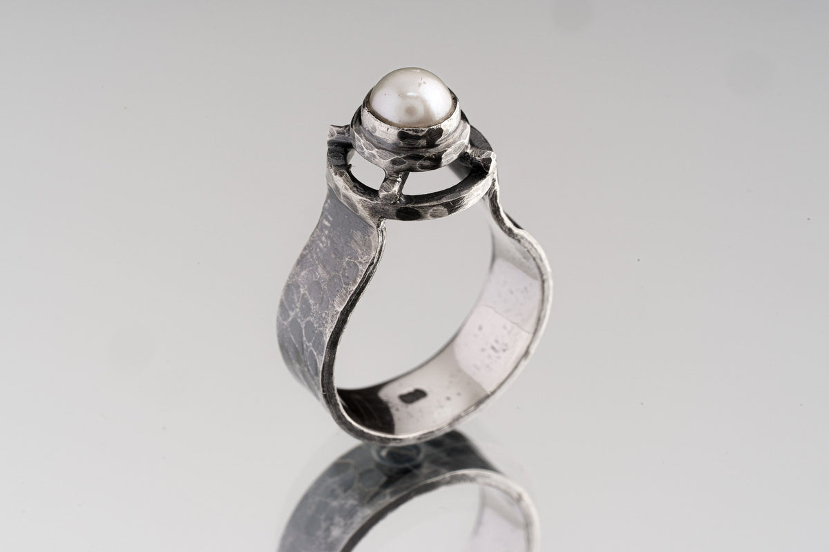 A Grade Basra Pearl Ring shown on white background with oxidized sterling silver texture and natural pearl centre.