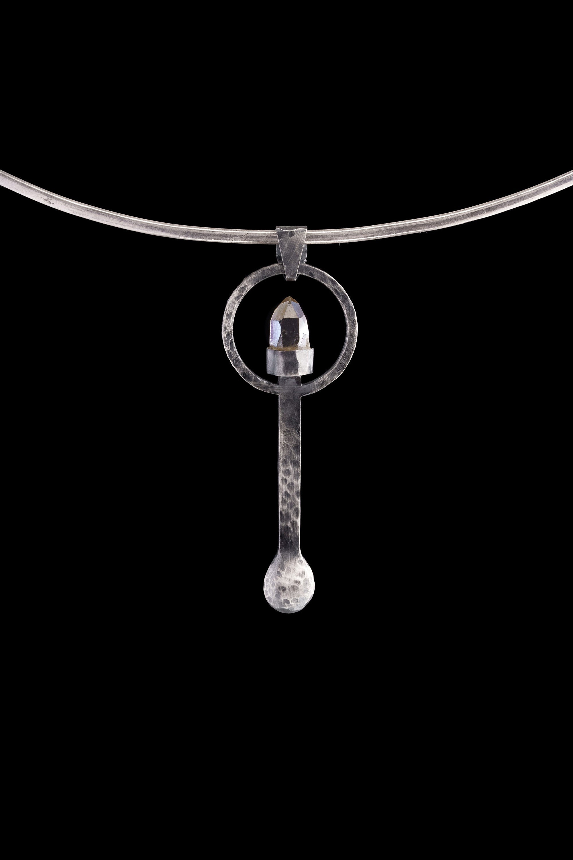 Raw Aquamarine ritual spoon displayed on a choker, showing wearable talisman styling and oxidized sterling silver form.