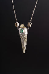 Himalayan Chlorite Quartz Nepalese Emerald Dravite pendant shown worn on a model, with oxidized 925 sterling silver and hoop chain.