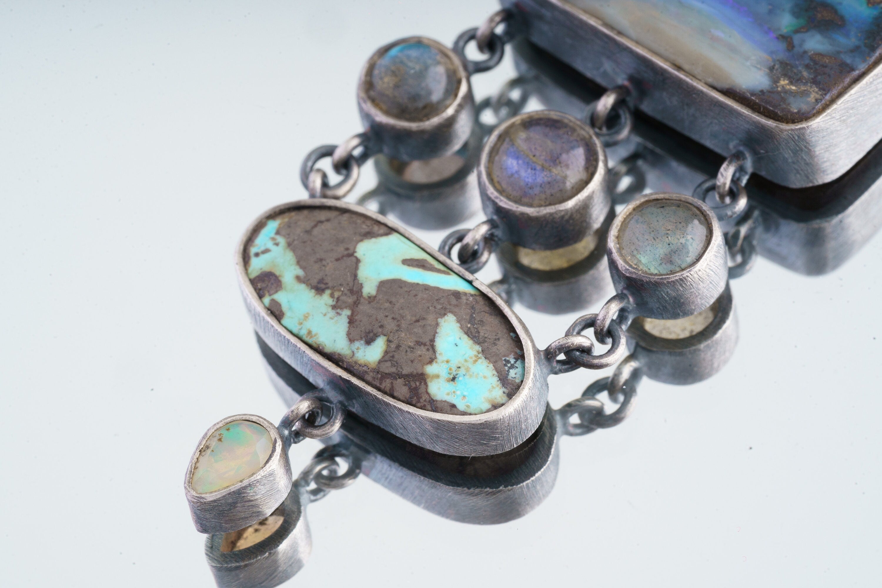 Textured Oxidized Sterling Silver Pendant, Ocean's Symphony Gems: Australian Opal, Labradorite, Royston Turquoise, Ethiopian Opal, Moonstone