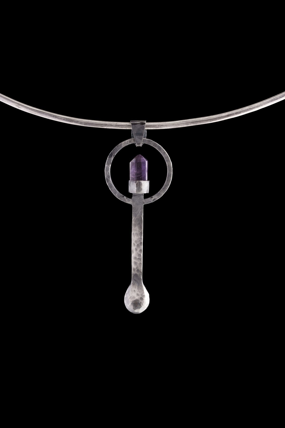 Amethyst ritual spoon pendant shown on a silver choker, with solid 925 sterling silver and purple generator stone.