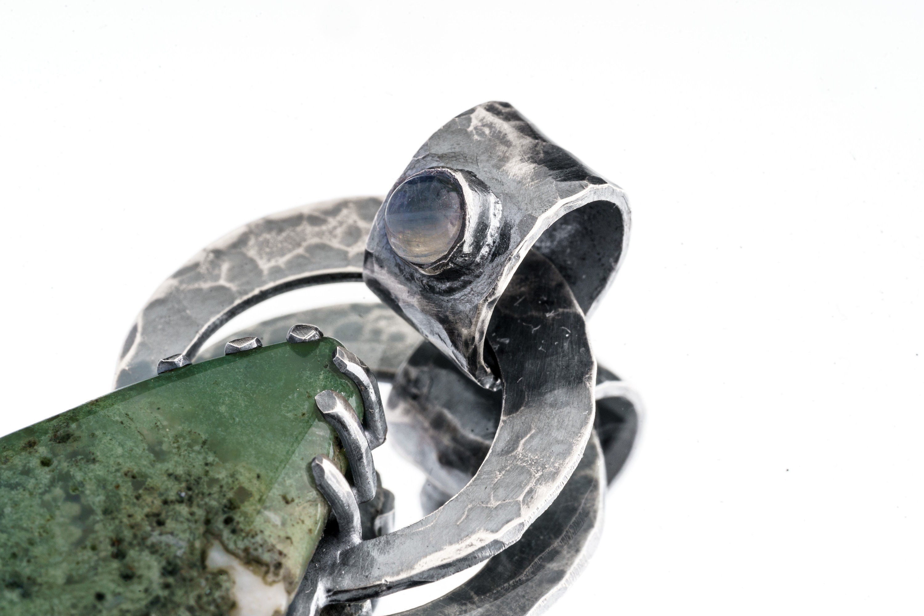 Cat Eye Moonstone Moss Agate pendant shown close-up with teardrop stone and heavy silver backing.