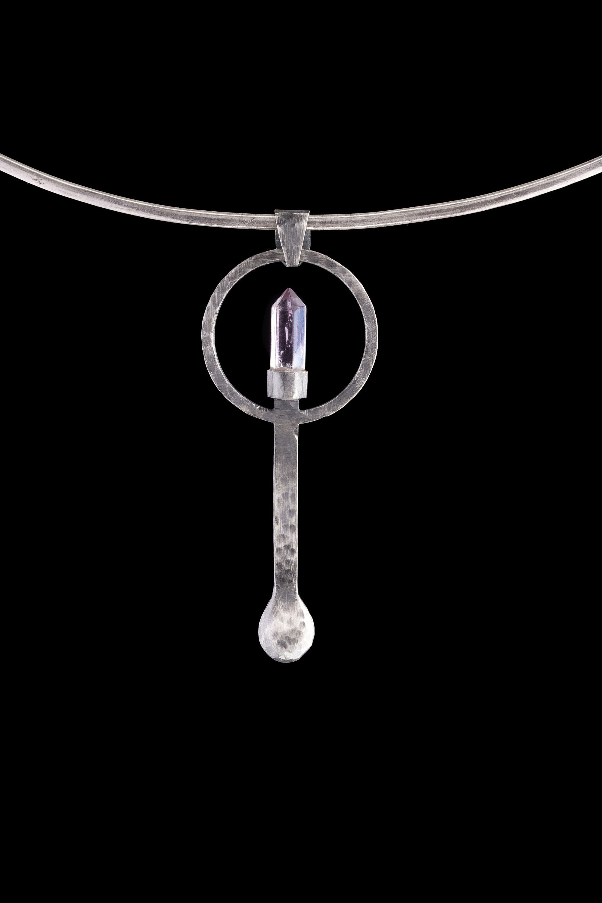 Amethyst Generator silver ritual spoon displayed on a choker, showing wearable talisman styling and spoon form.