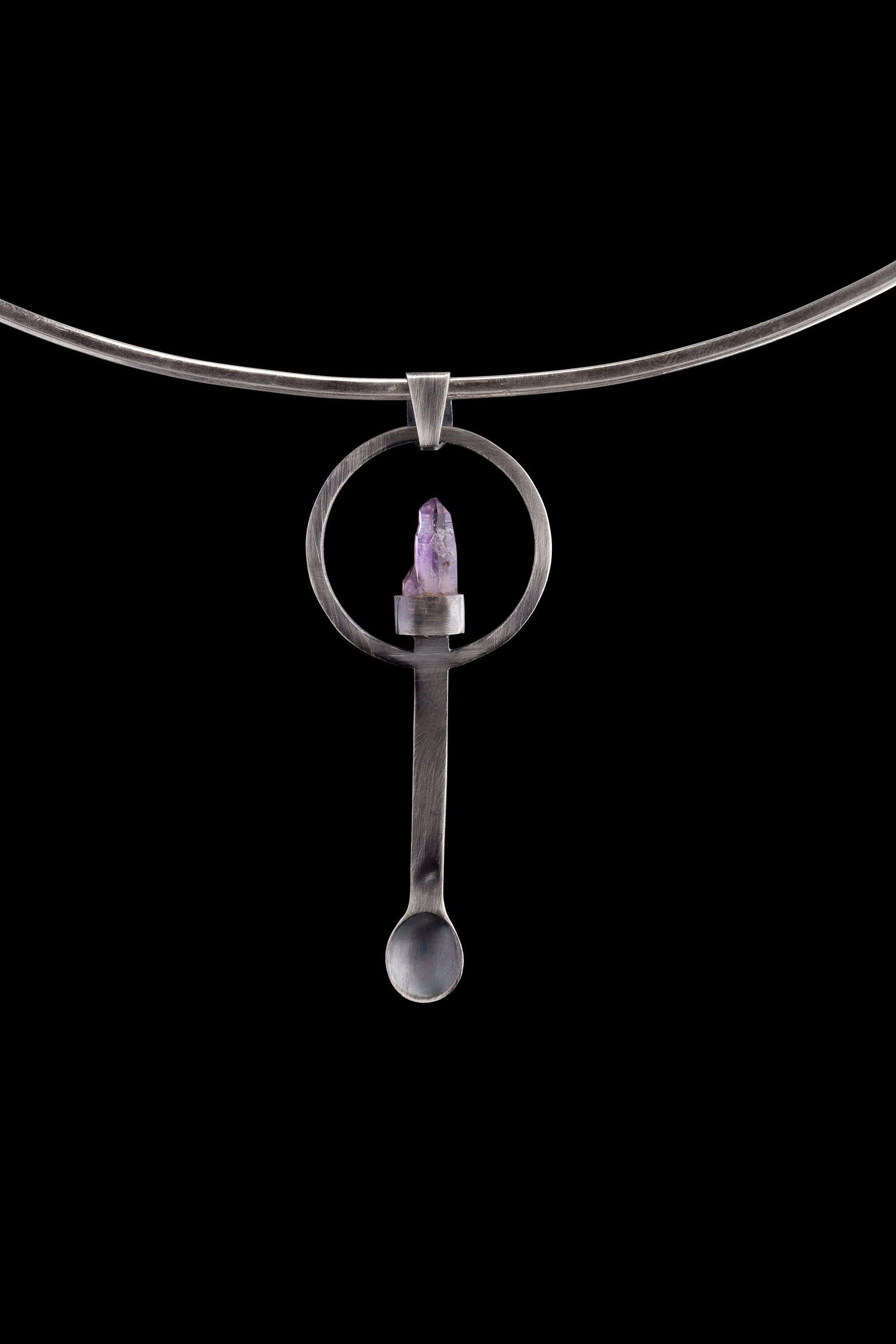 Twin Vera Cruz Amethyst ritual spoon pendant displayed on a choker, showing wearable talisman styling and silver spoon form.