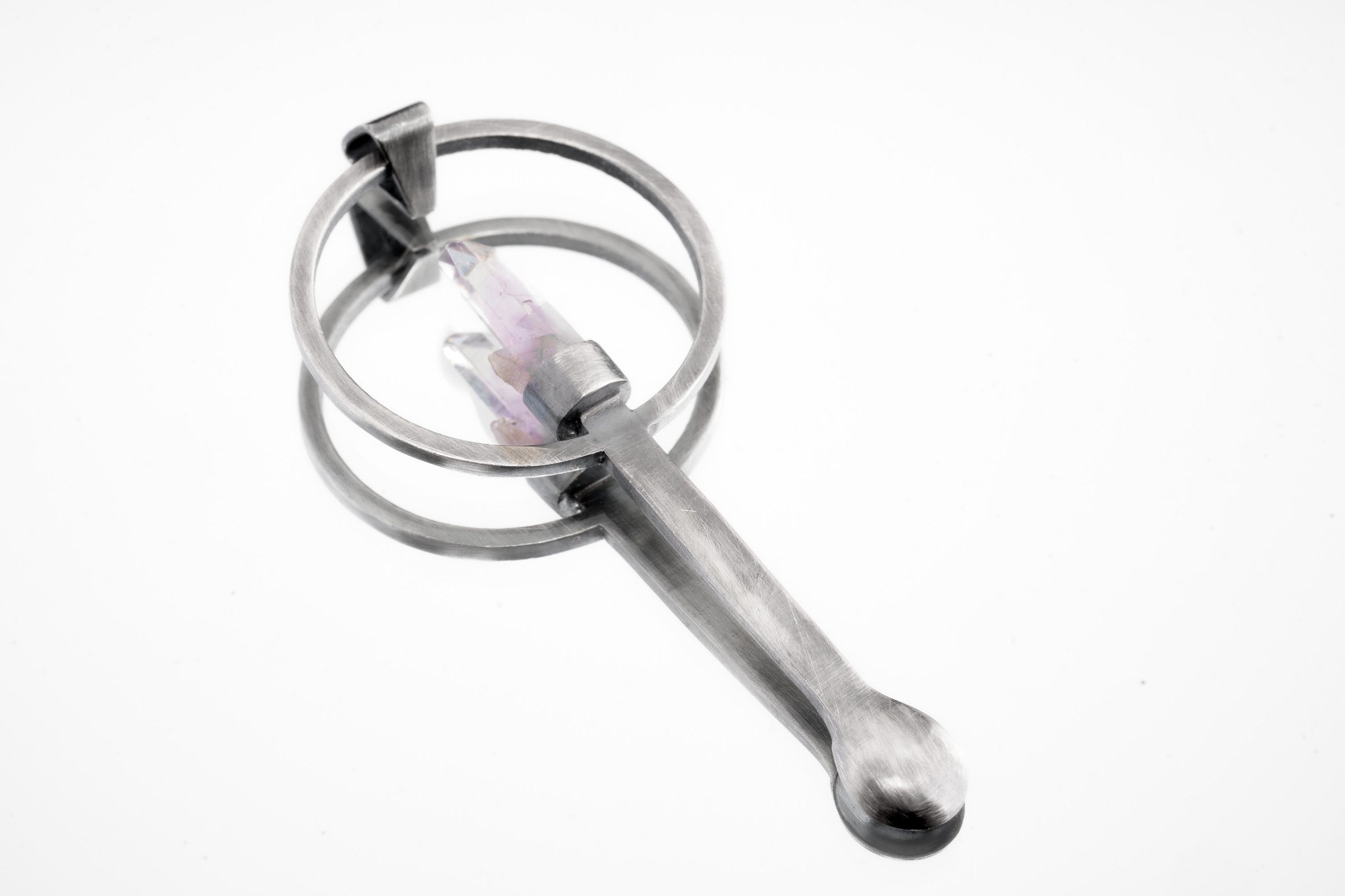 Double Terminated Vera Cruz Amethyst spoon pendant shown on white background with solid 925 sterling silver and pale purple crystal.