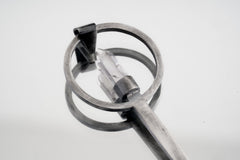 Clear Quartz Generator spoon pendant shown close-up with solid 925 sterling silver and bright crystal point.
