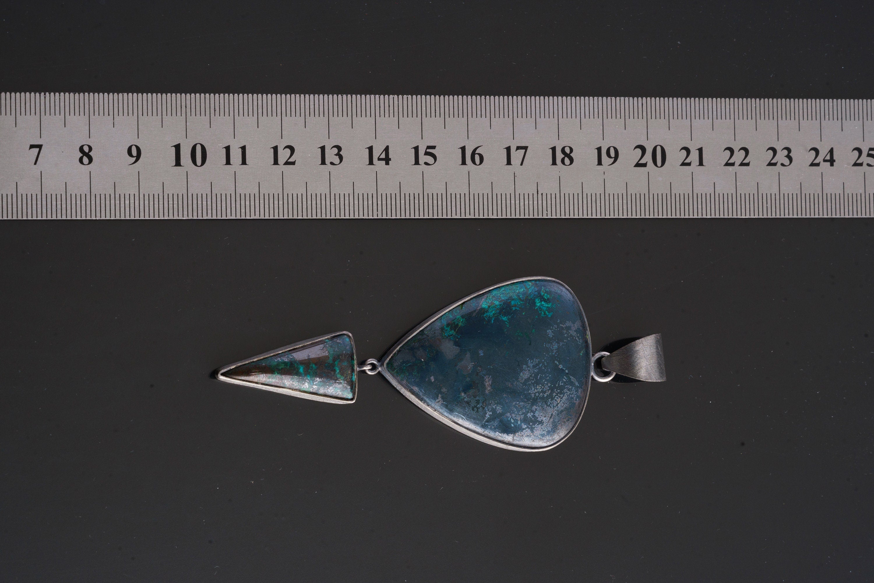 Malachite Pyrite Chrysocolla Azurite pendant shown beside a ruler for scale as a large sterling silver statement piece.