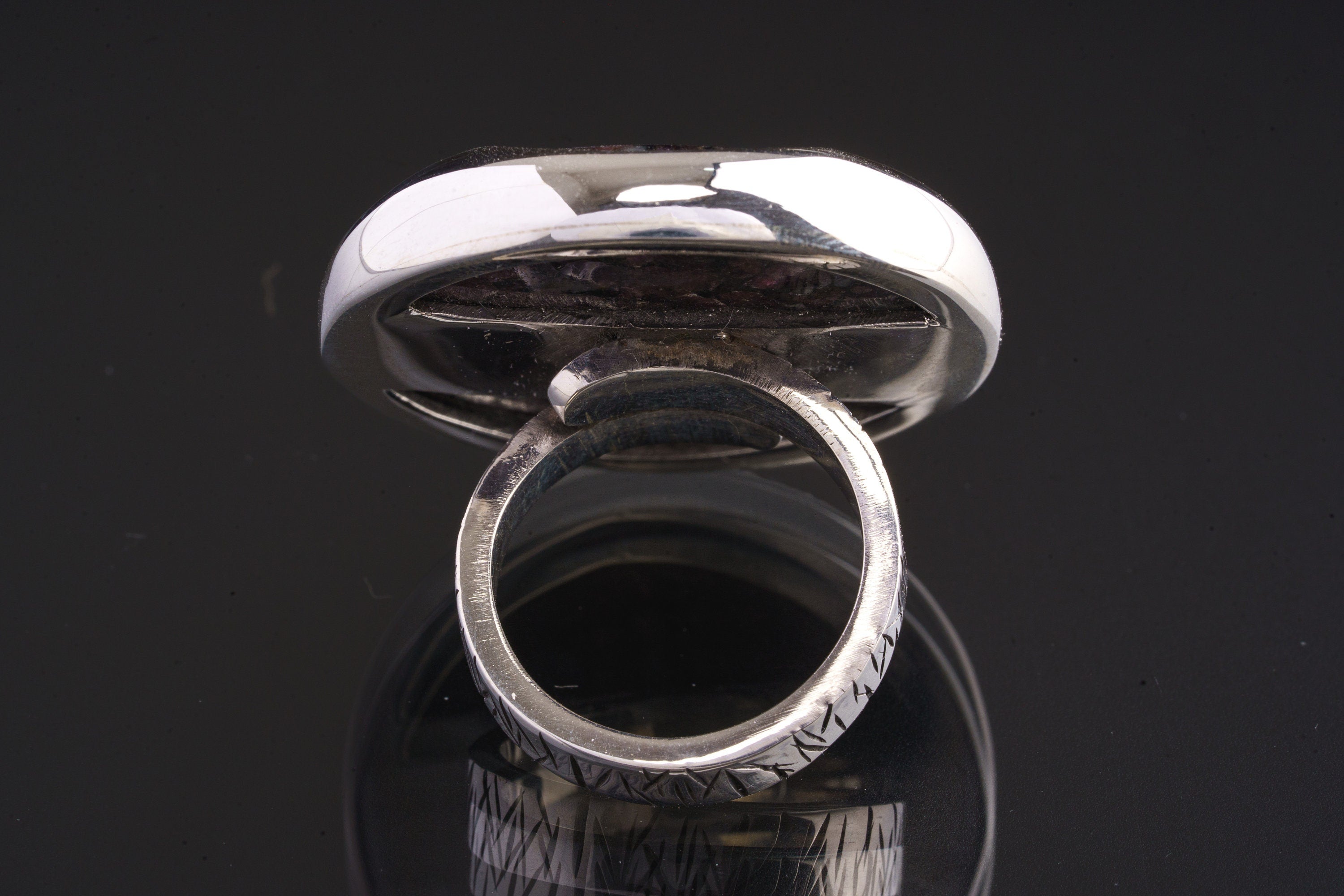 Back view of Ruby Mica Quartz Matrix adjustable ring showing open band and cut-out sterling silver support plate.