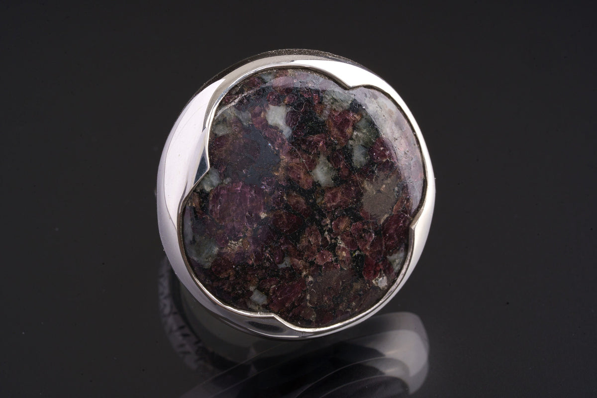 Ruby in Mica and Quartz Matrix adjustable ring in polished 925 sterling silver with textured band and waved bezel.