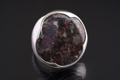 Ruby in Mica and Quartz Matrix adjustable ring in polished 925 sterling silver with textured band and waved bezel.