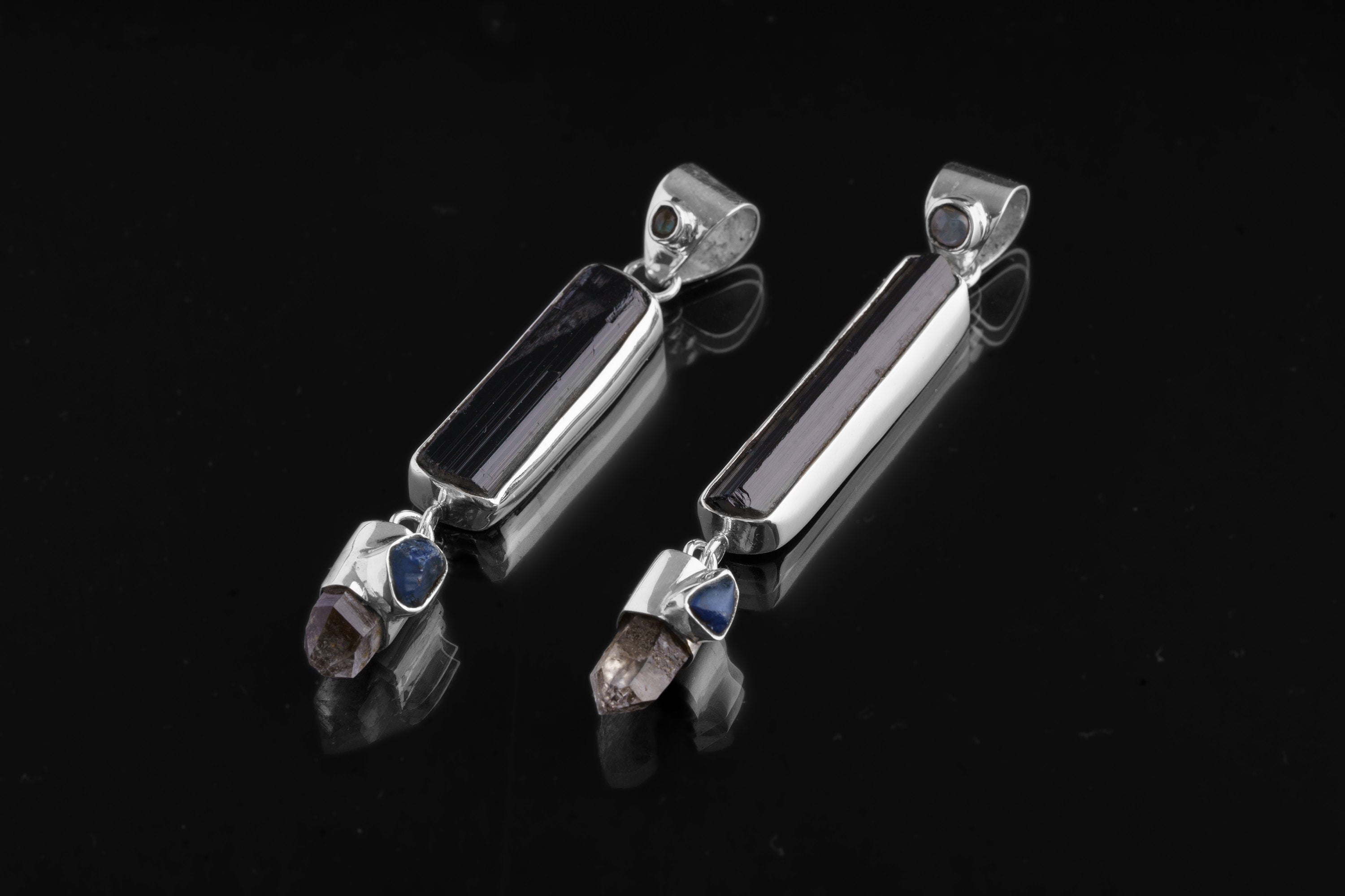 Blue Moonstone Tourmaline Smoky Quartz Sapphire pendant shown on dark background with high-shine sterling silver.