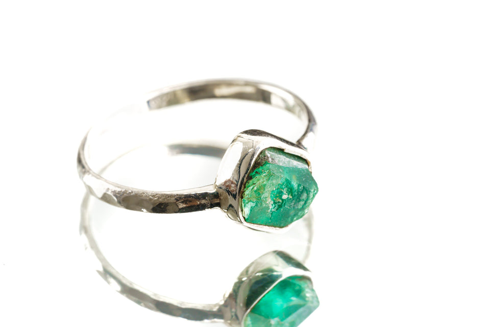 Australian Raw Emerald sterling silver stack ring shown on a light background, with green gemstone and hammered band.