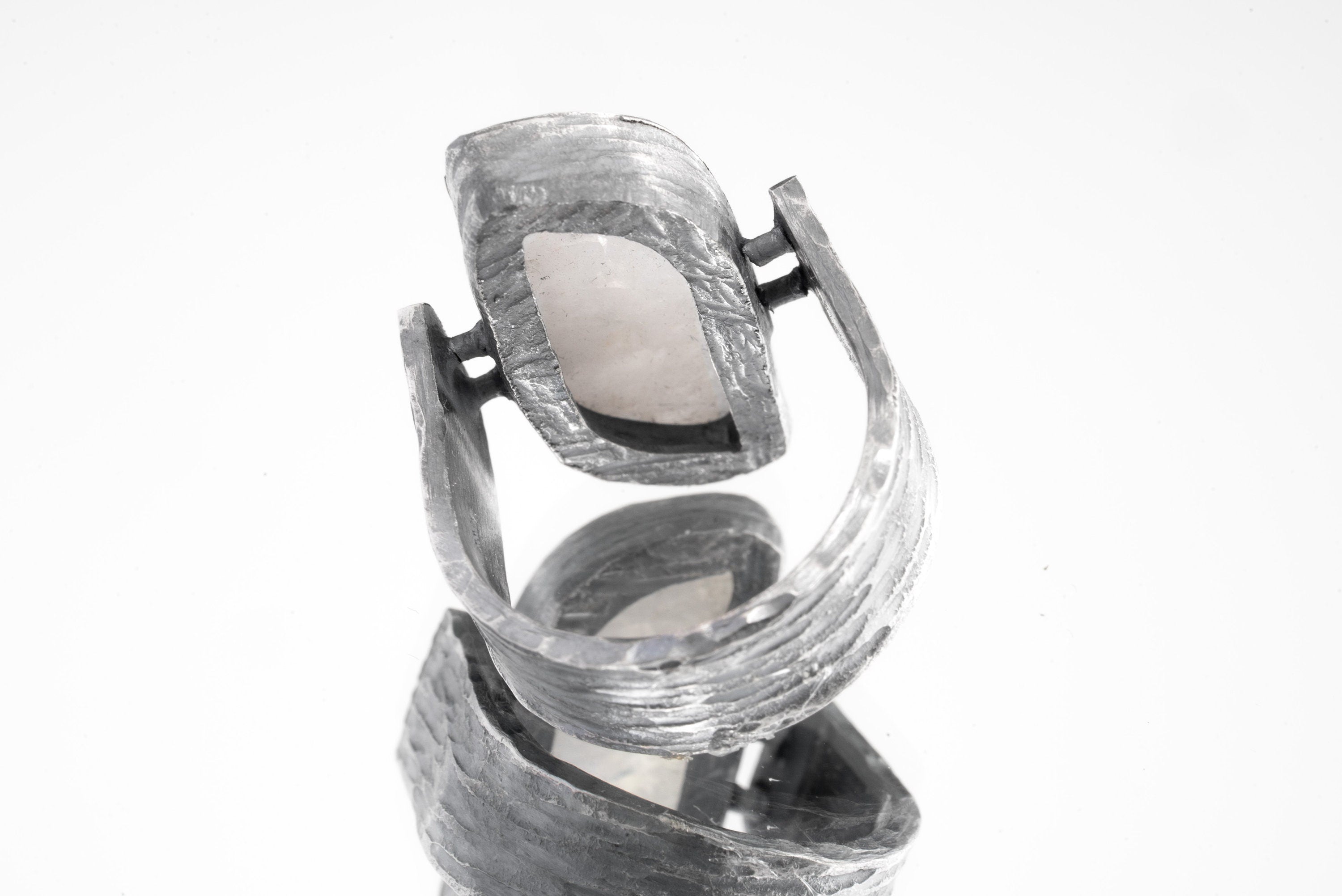 Back view of Lunar Sanctuary Moonstone ring showing U-shaped band, oxidized texture, and sculptural silver construction.