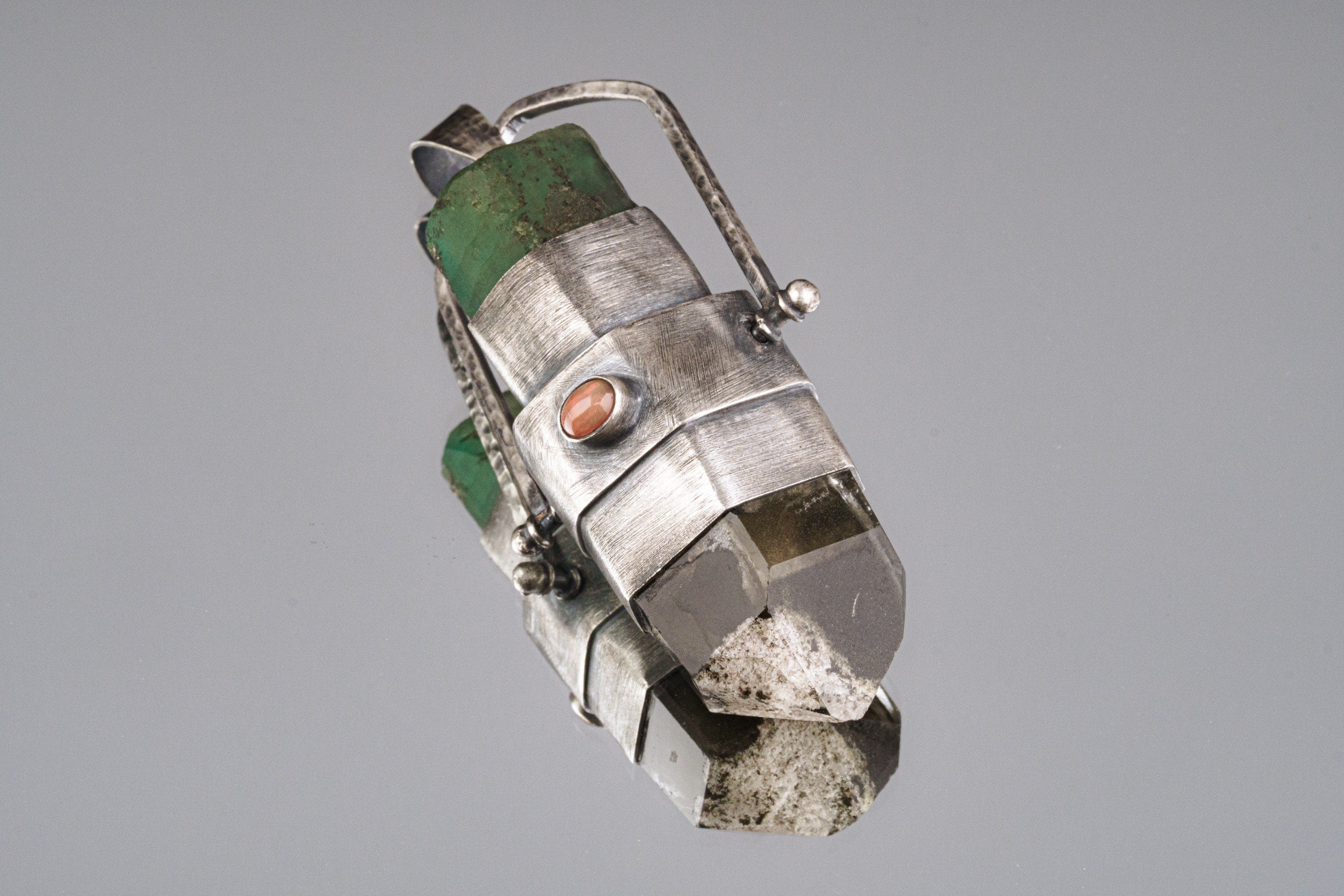 Large Australian Emerald Phantom Chlorite Quartz spinner pendant shown on a white background with oxidized sterling silver setting.