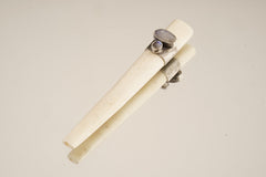 Blue Moonstone Antique Bone Tube Pendant shown on a light background with polished sterling silver band and two stones.