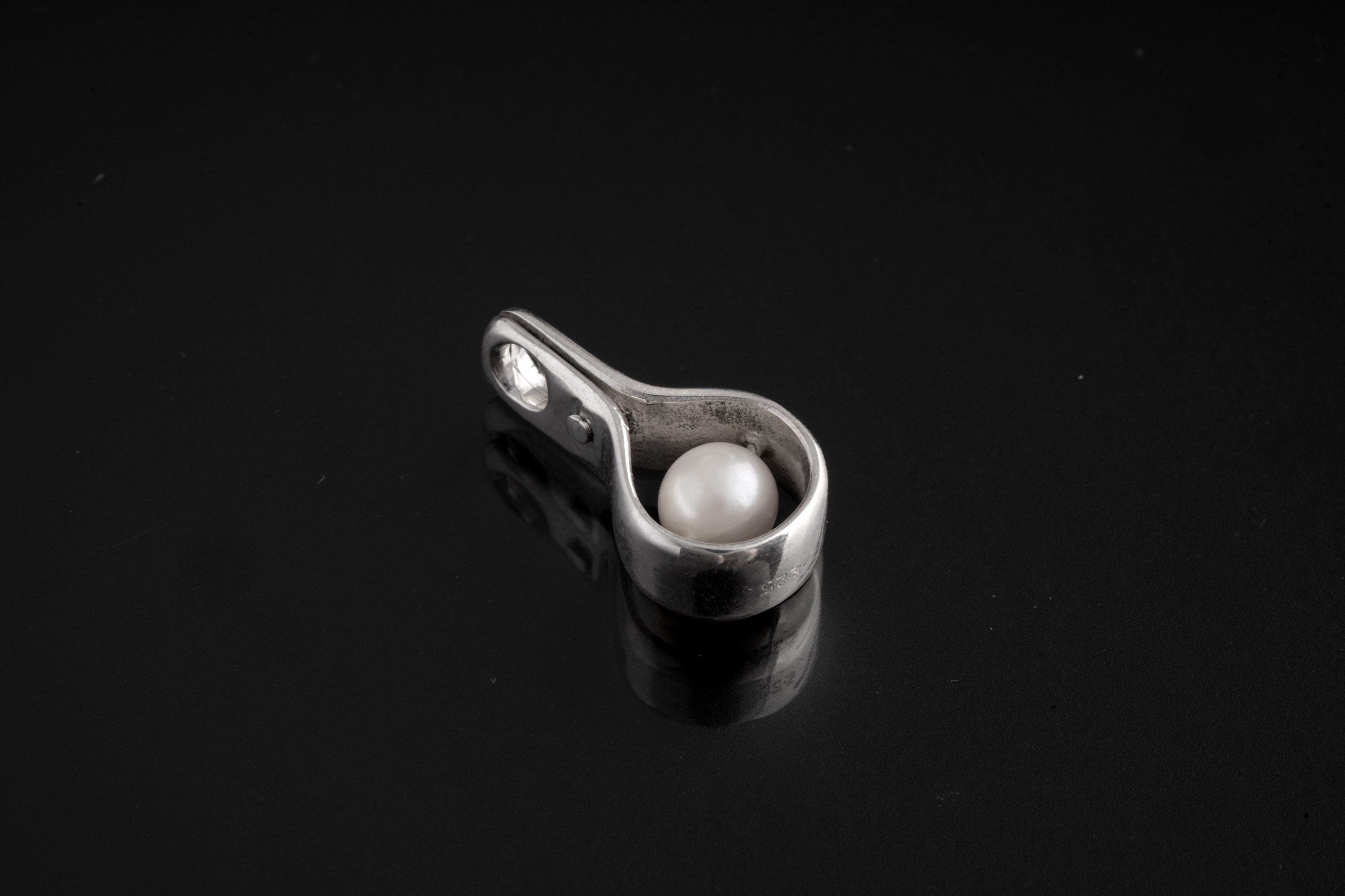 Pearlescent Spinner Elegance Pendant: Pearl - Sterling Silver Pendant