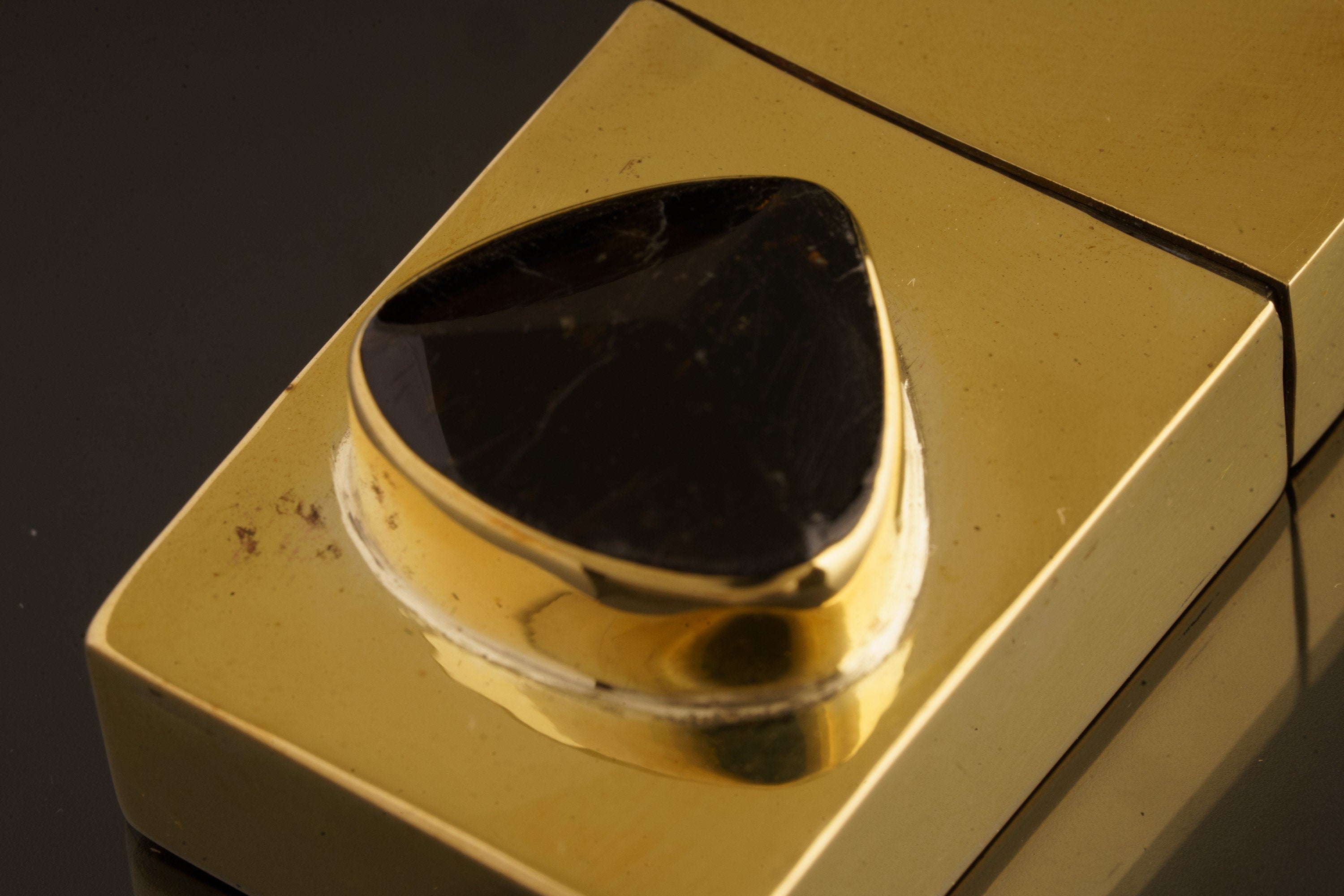 A Masterpiece of Utility and Mystique: Antique Matchbox adorned with Black Tourmaline - Polished Cast Brass Matchbox
