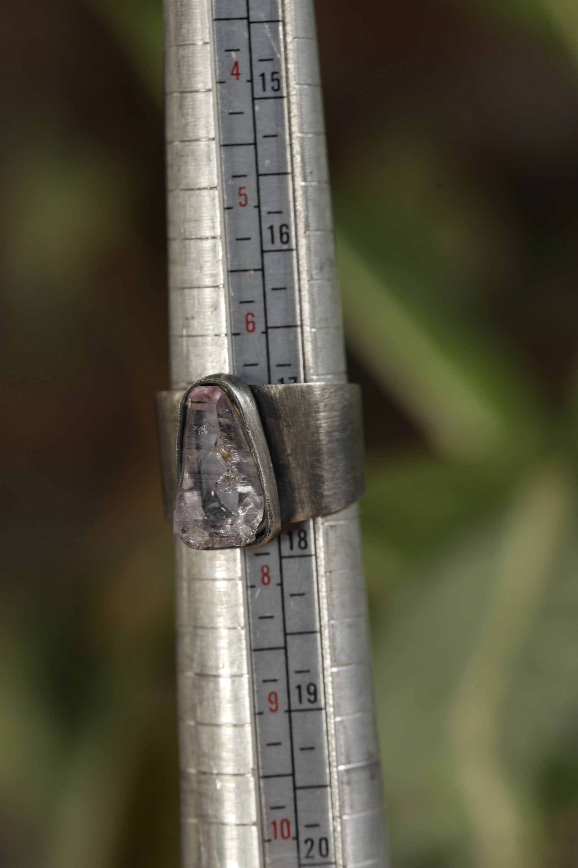 Vera Cruz Amethyst adjustable ring shown beside a ruler for scale, with oxidized 925 sterling silver band.