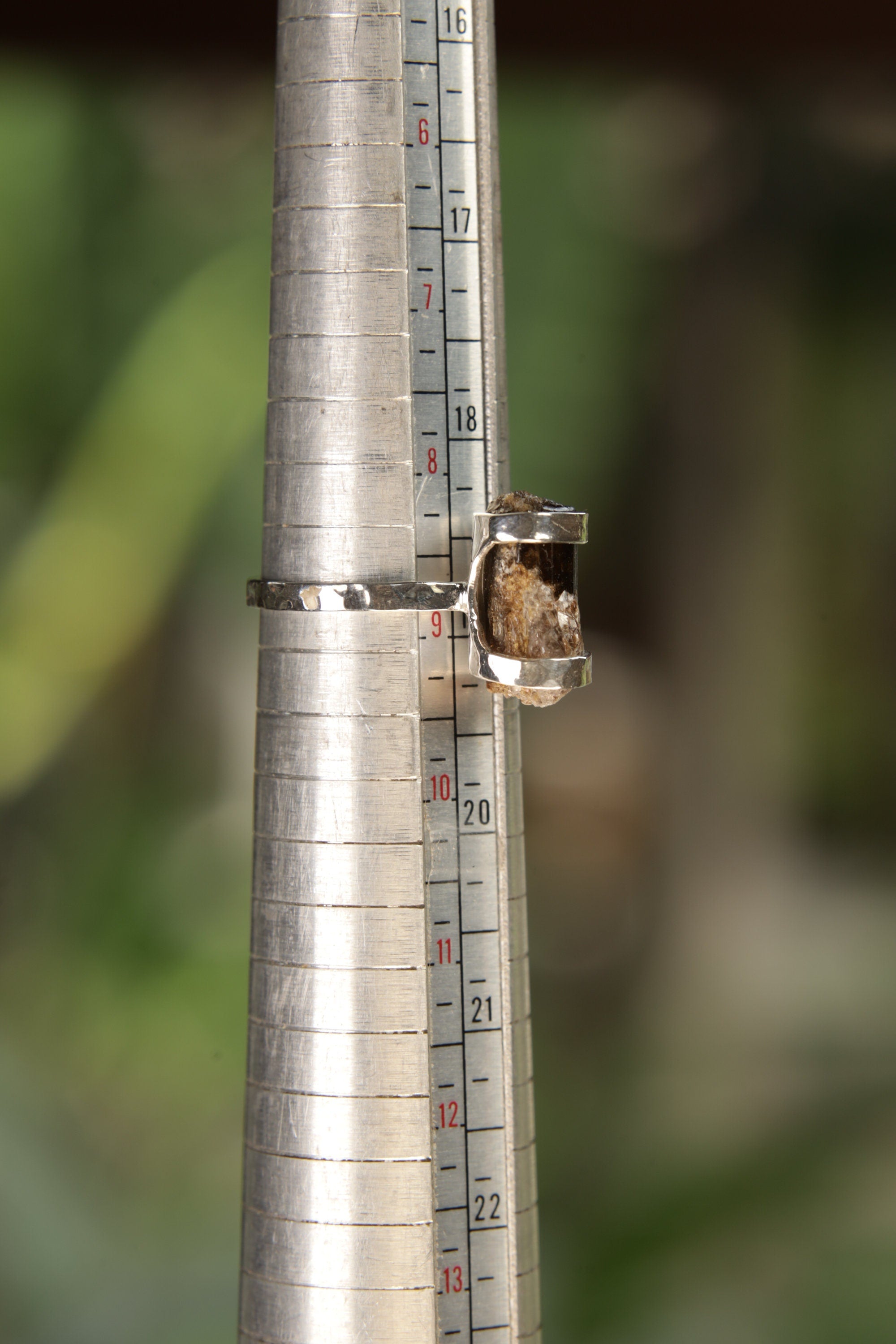 Dravite Tourmaline sterling silver ring shown on a mandrel for size reference, appearing around US size 8.5 to 9.