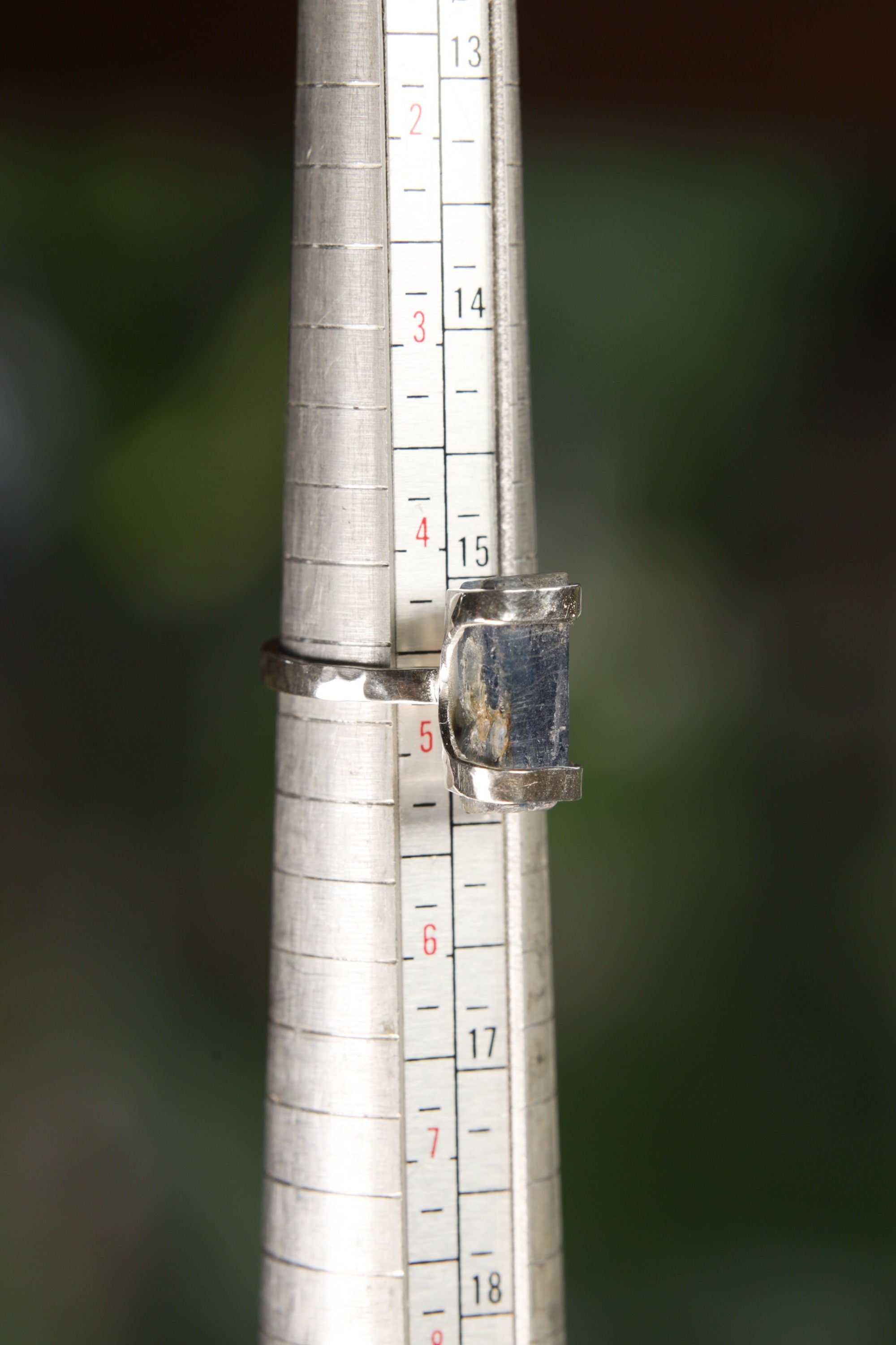 The mandrel image suggests the ring is approximately US size 5 to 5.5, but the exact size should be confirmed before publishing. The pasted text states Australian Ocean Kyanite, so that wording was used. No more specific mine or locality was added.