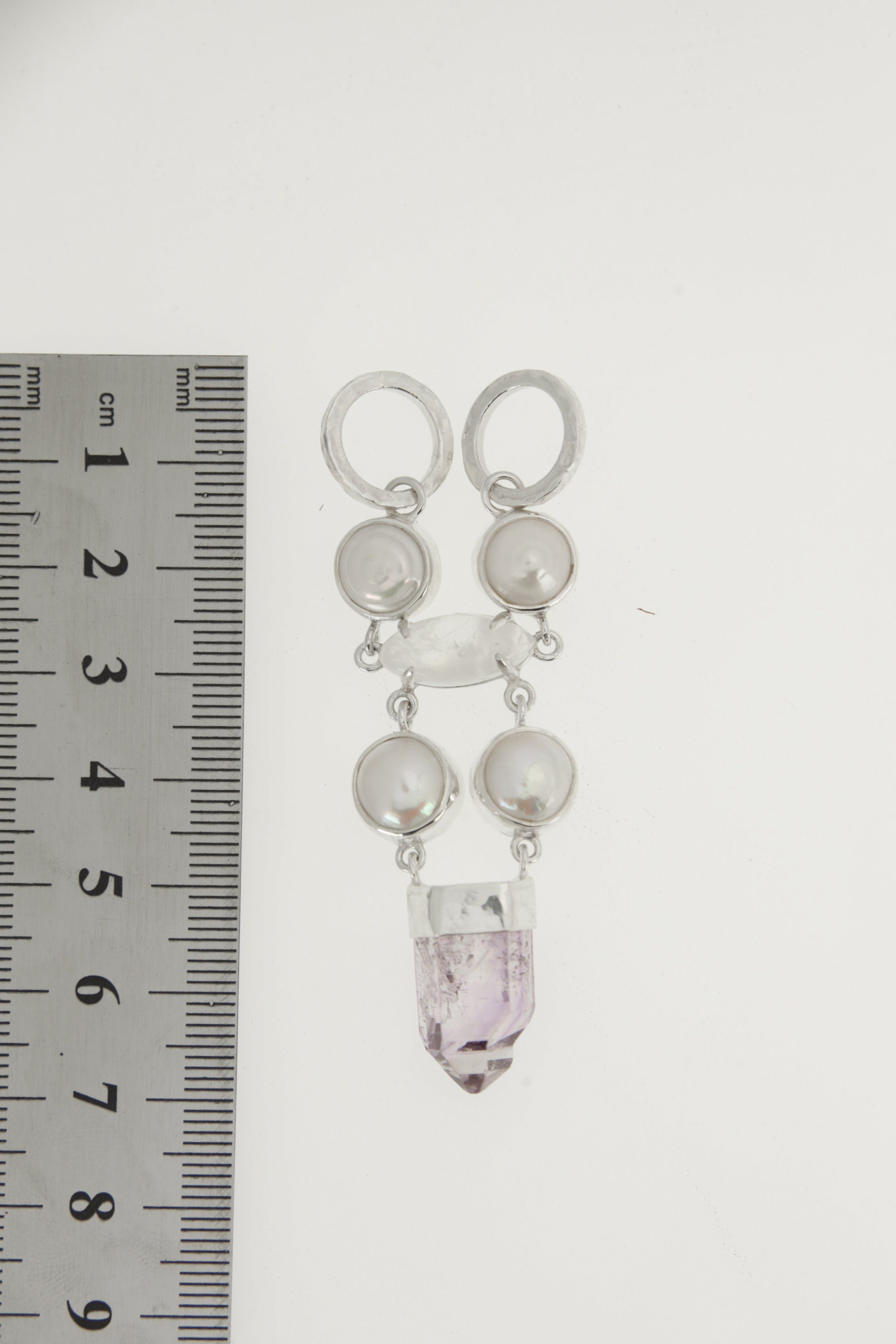 South Sea Pearl Moonstone Vera Cruz Amethyst pendant shown beside a ruler for scale, measuring approximately 7 cm long.