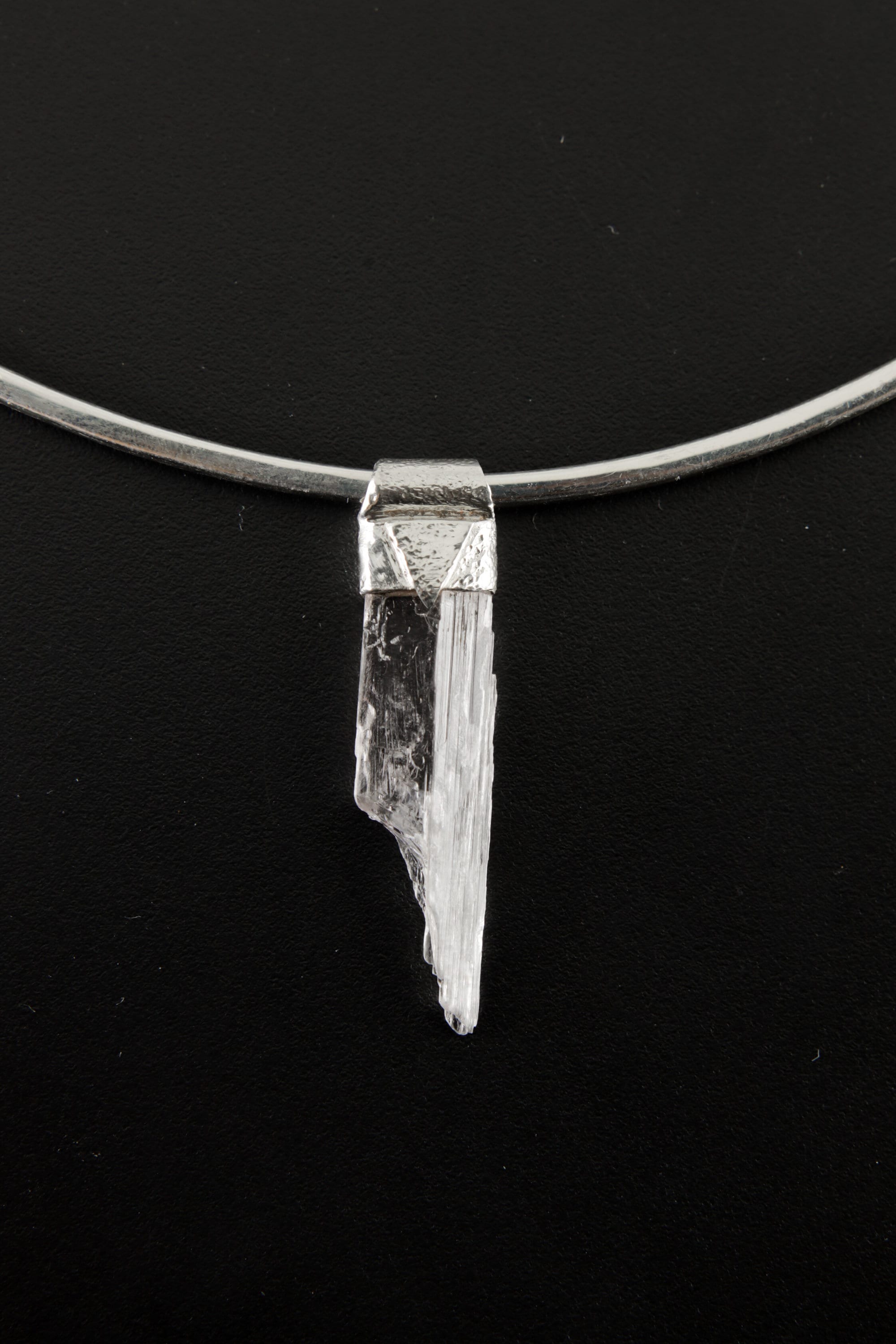 Pink Kunzite Stack Pendant shown on black background with textured sterling silver cap and adjustable necklace.