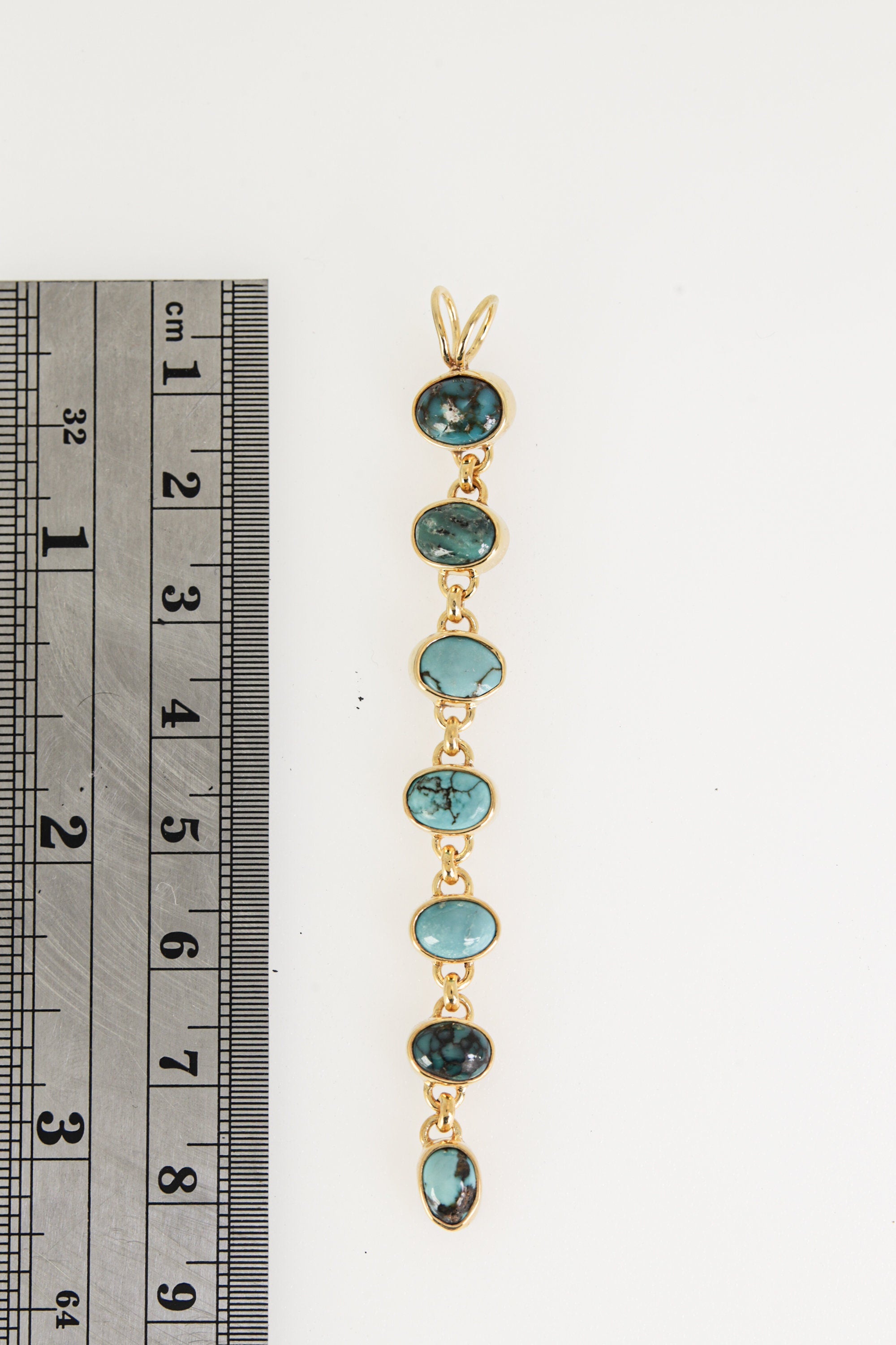 Gold-Plated Sterling Silver Turquoise Pendant: 7-Stone Cascade Amulet