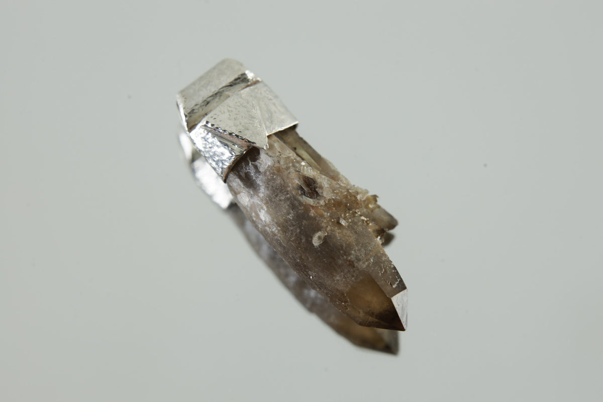 Torrington Cathedral Drusy Phantom Laser Citrine Quartz Stack Pendant shown on light background with sterling silver cap and golden crystal point.