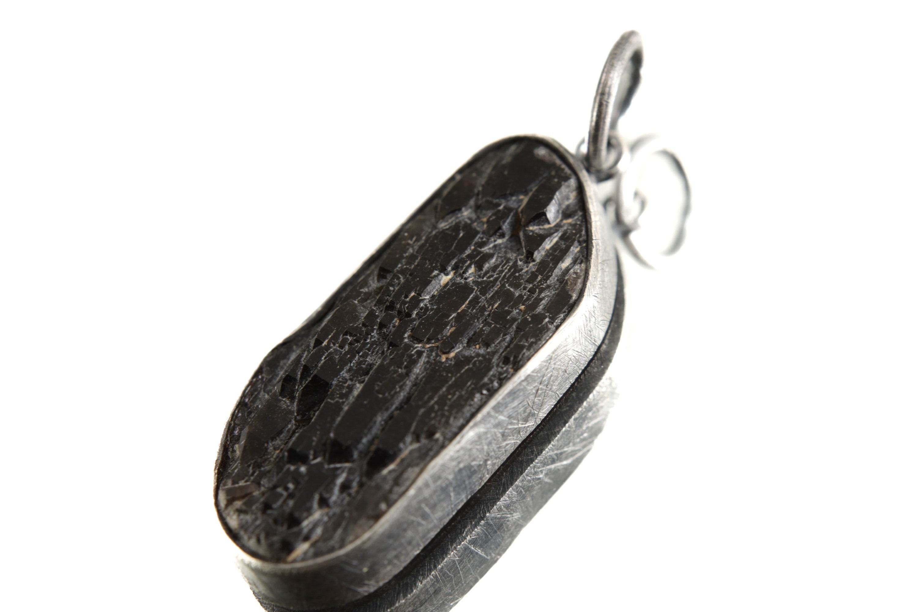 Close-up of Torrington Smoky Citrine pendant showing dark crystal markings and brushed oxidized silver setting.
