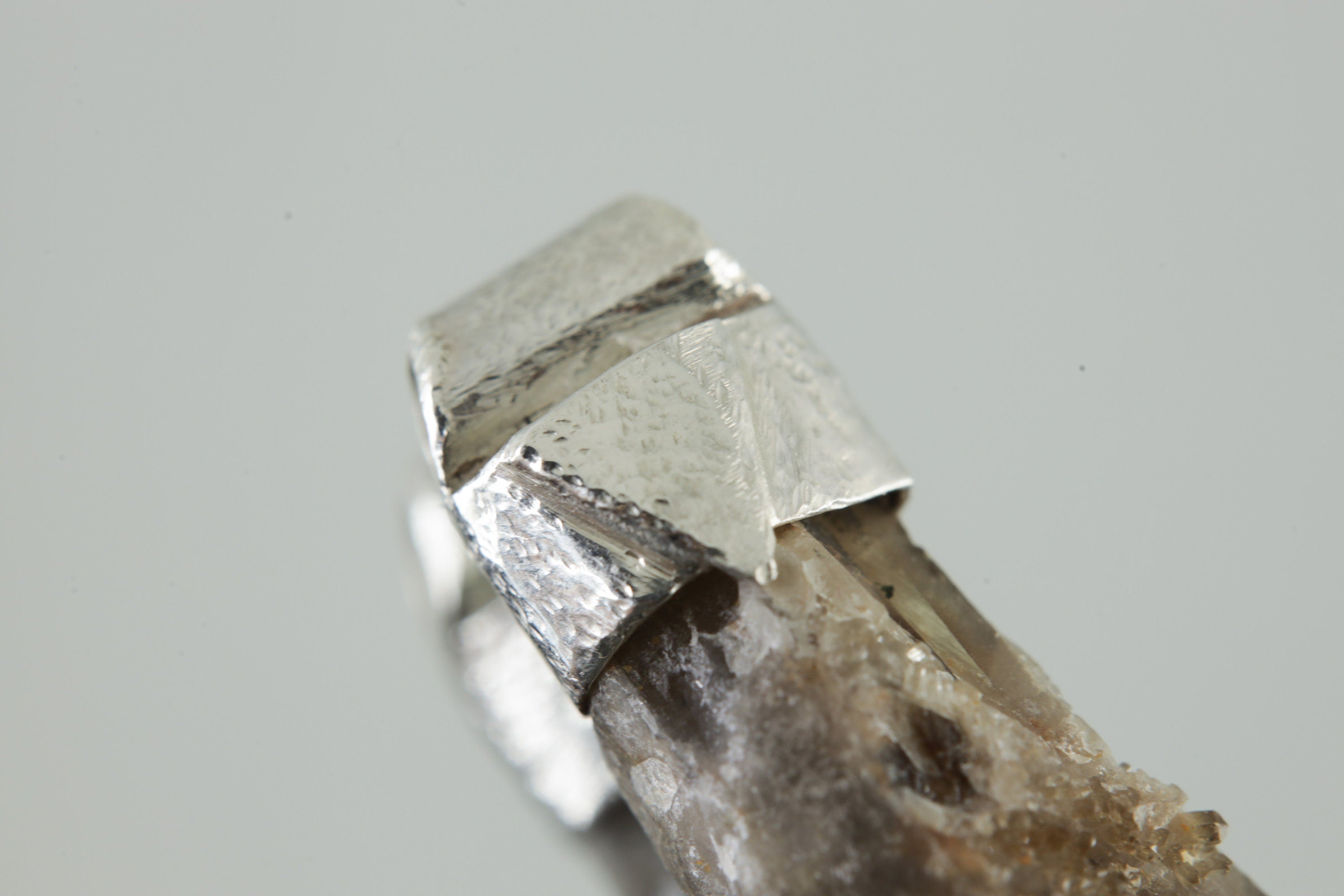 Close-up of Torrington Citrine Quartz showing drusy sparkle, phantom growth, laser-like point, and textured sterling silver cap.