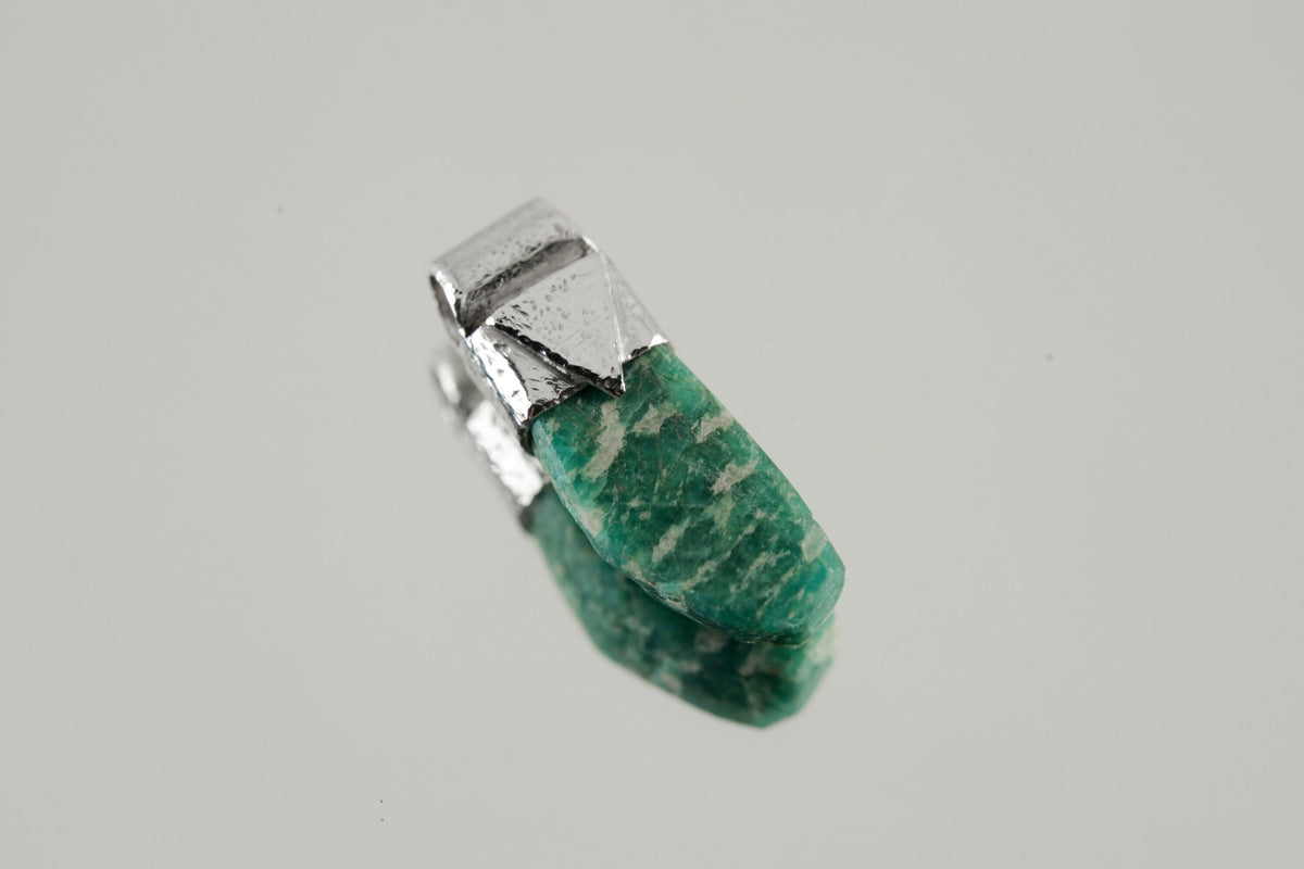 Rough Cut Amazonite Stack Pendant shown on light background with sterling silver cap and blue-green feldspar stone.