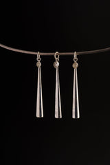 Herkimer Diamond spoon pendant displayed on a choker, showing slim silver ritual scoop styling.