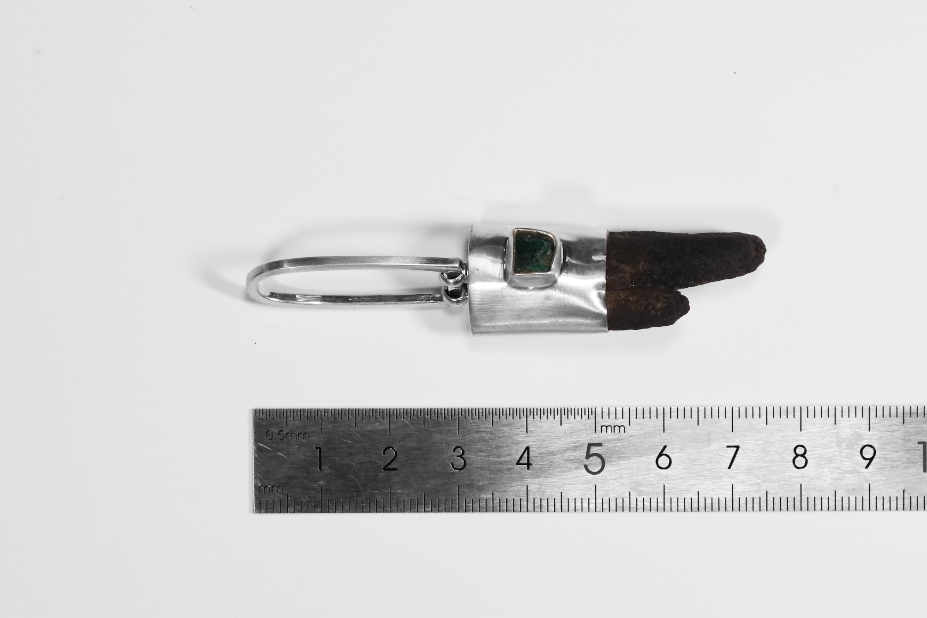 Himalayan Brown Dravite Tourmaline Diamond pendant shown beside a ruler for scale, measuring approximately 4.5 to 5 cm long.