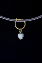 Single Blue Tourmaline hoop earring shown on a dark background with gold-plated silver and raw crystal slice.