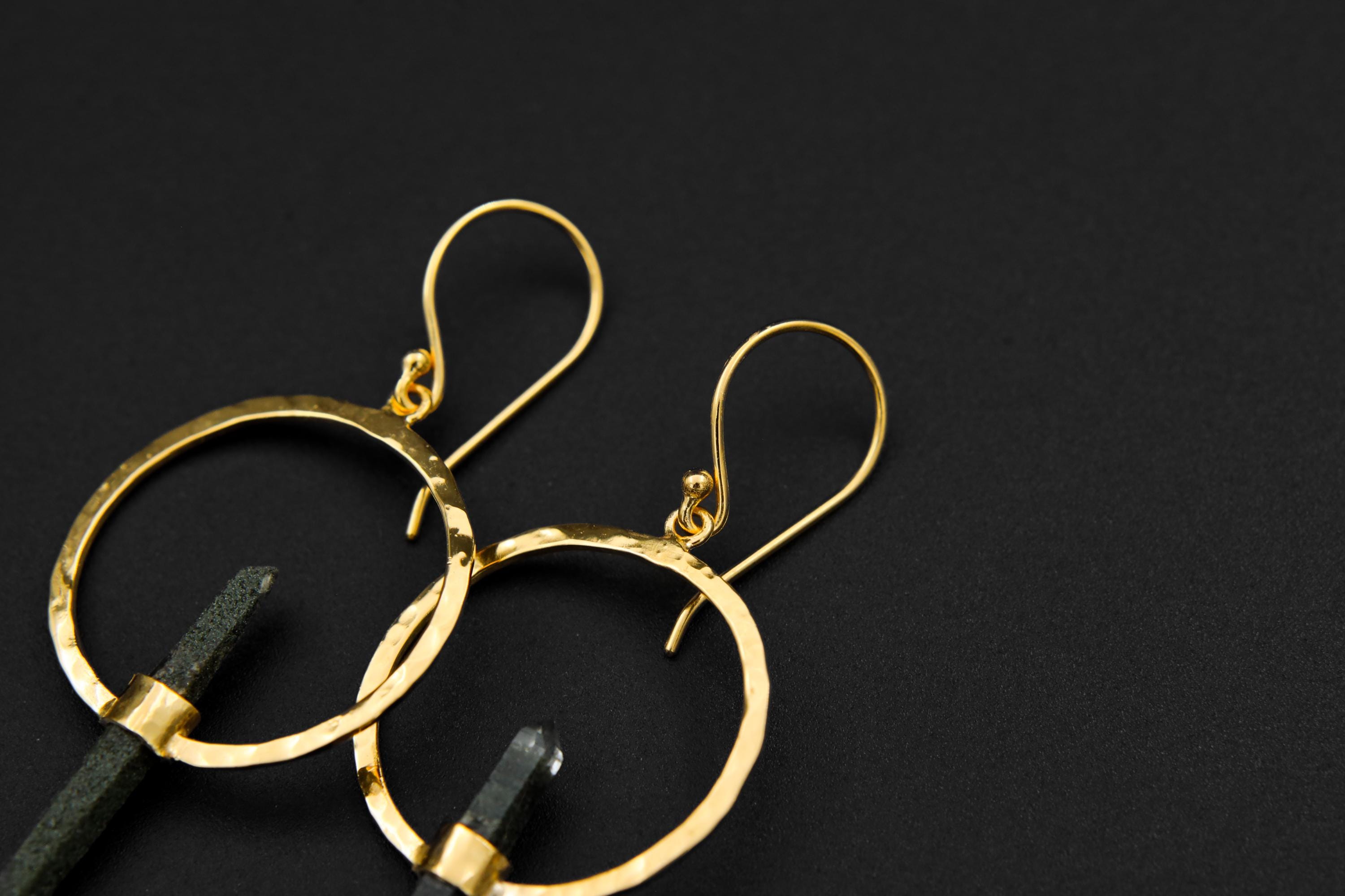 Detailed view of Chlorite Phantom Quartz portal earring showing double-terminated crystal, silver hoop hook, and gold-plated accent.