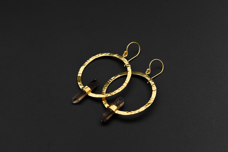 Australian Smoky Quartz portal earrings shown on dark background with textured silver circles and raw crystal points.