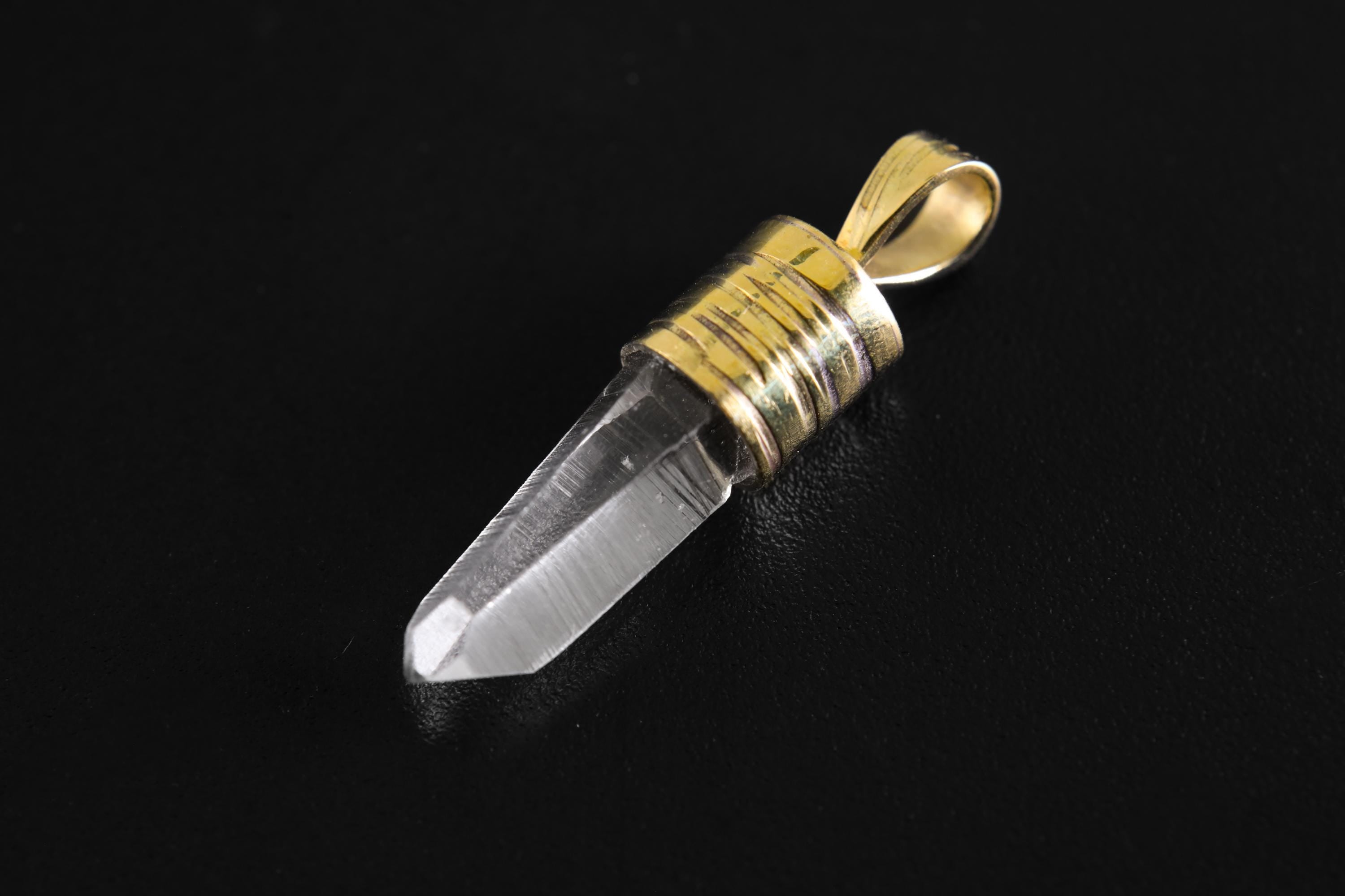 Hand-fossicked Australian Quartz point pendant with brushed 18k gold-plated silver cap and thick round coil bail.