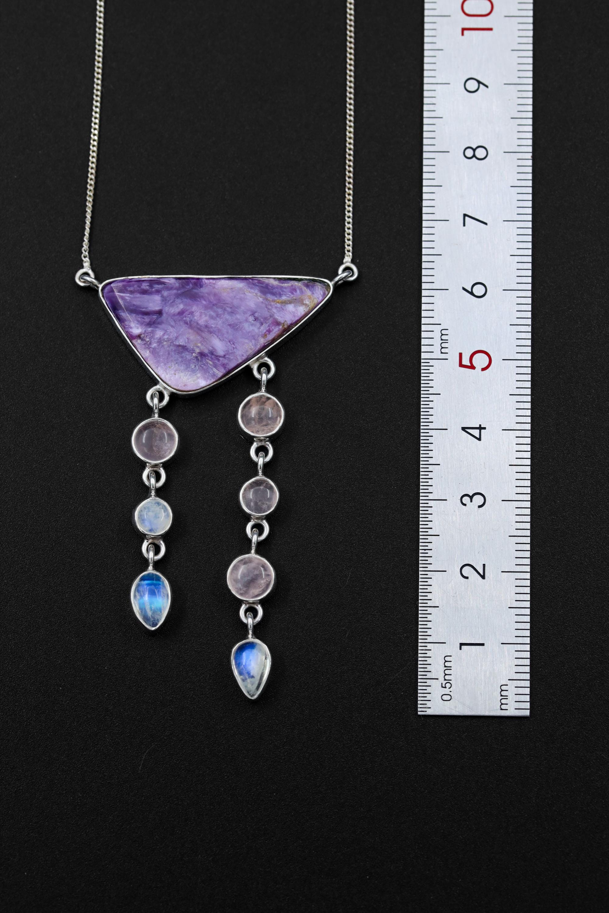 Chlorite Rose Quartz Blue Moonstone necklace shown beside a ruler for scale, with triangular centrepiece and cascading dangles.